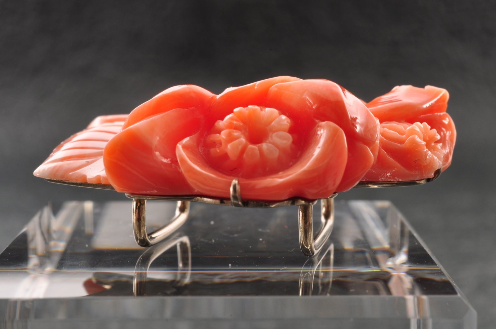 Pink coral OBIDOME, carved “camellia” (38mm (1.49in) total 50.0ct) Certificate.