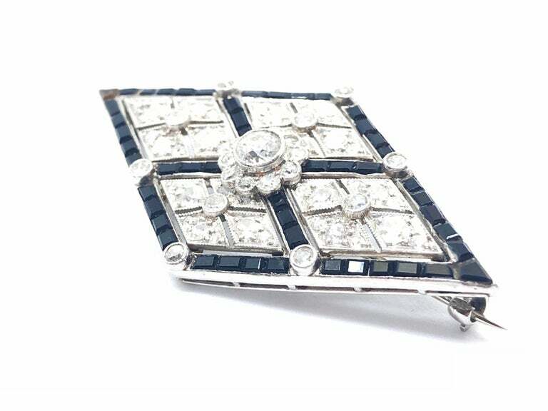 Lozenge Shape With Round Cut Cubic Zirconia & Calibre Cut Onyx Border Brooch