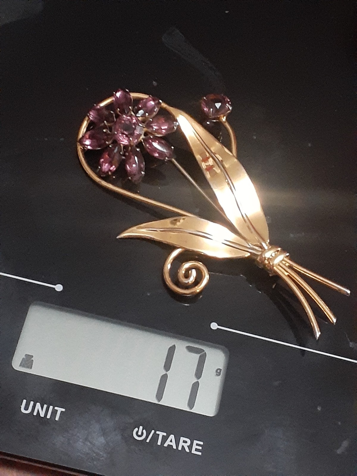 Sterling silver gold plated prong set purple glass flower & stem leaf brooch
