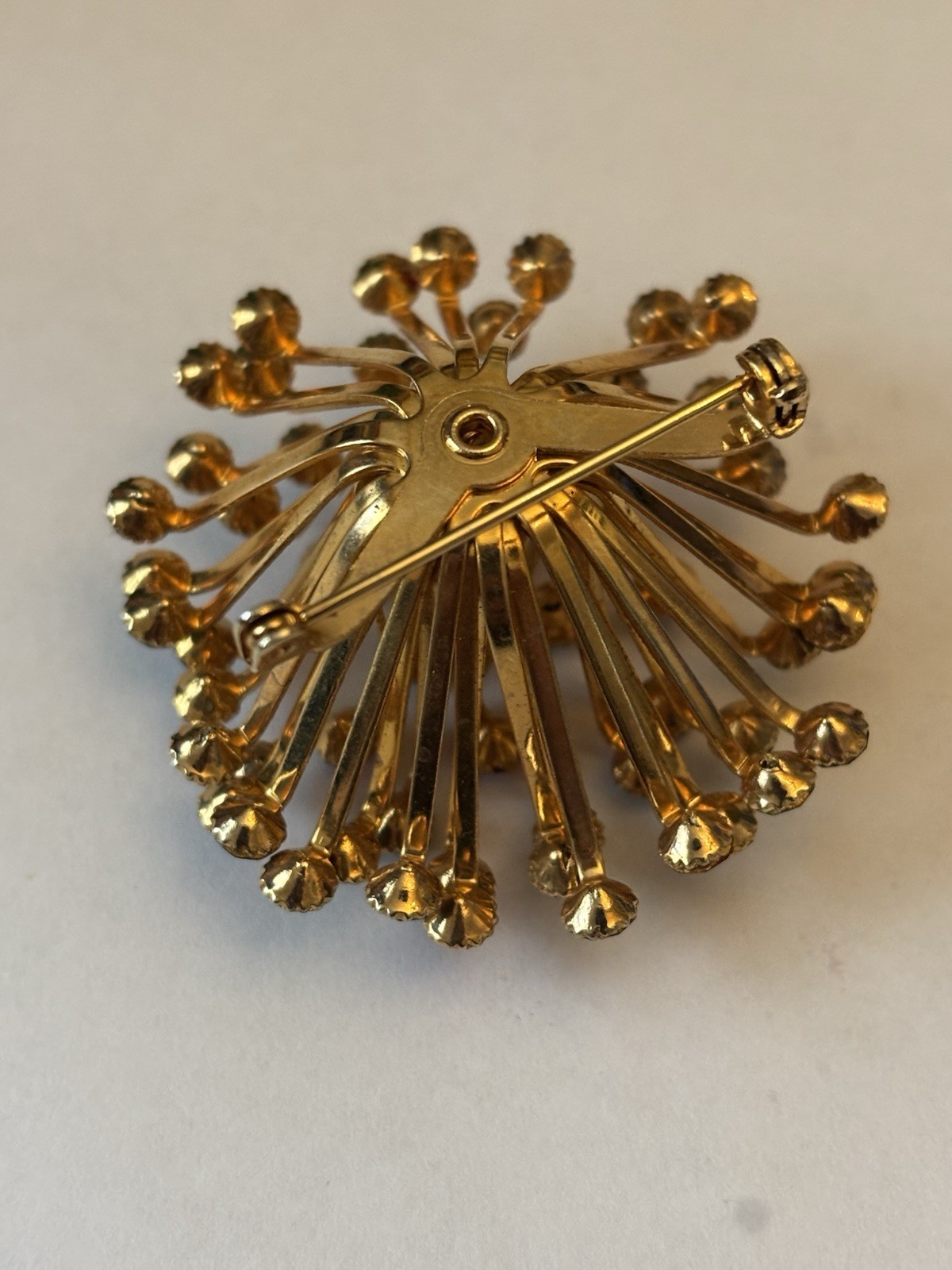Blue And Pink/ Purple crystals in Gold metal setting round brooch/pin