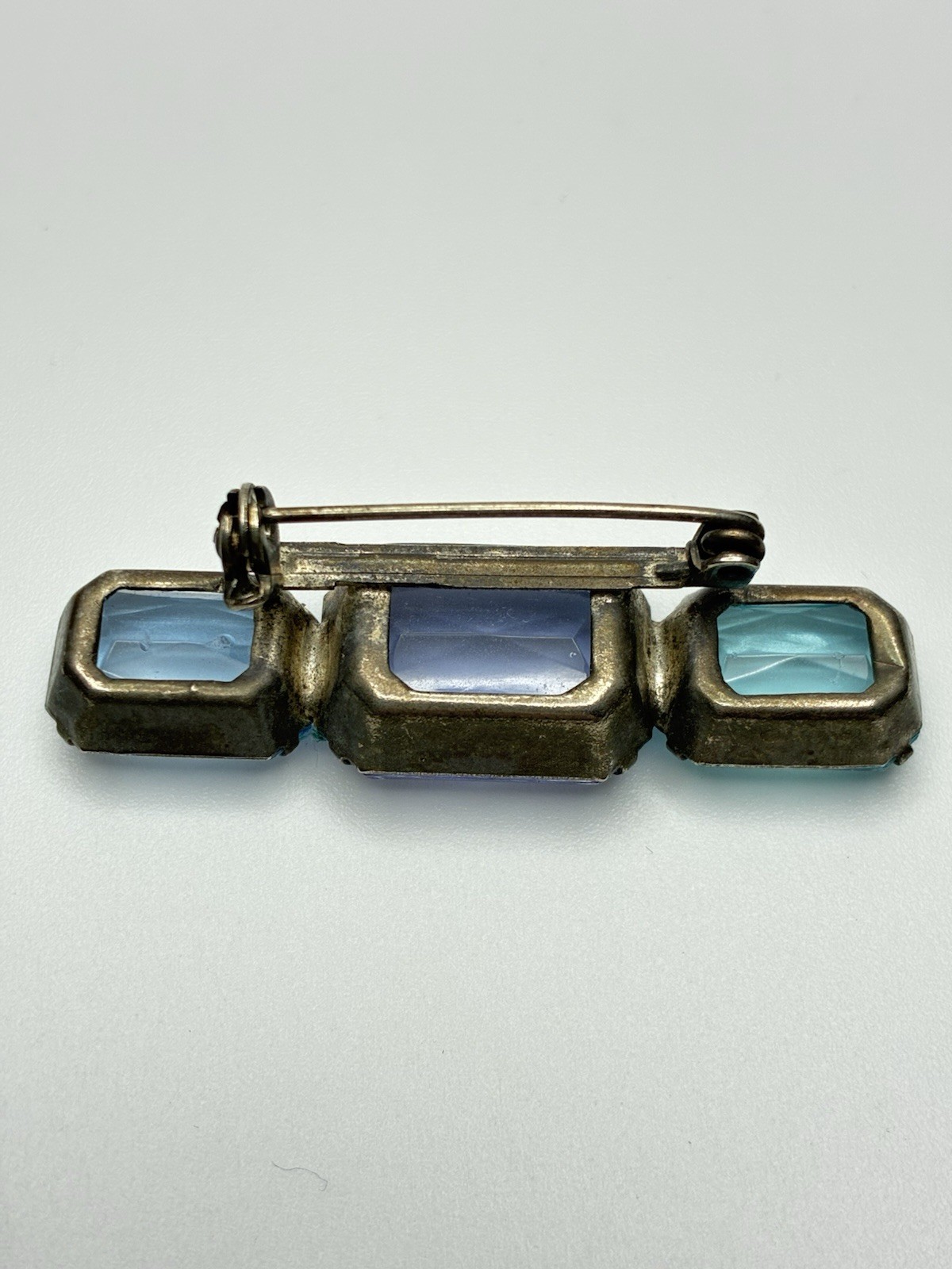 Antique Silver Tone Brooch With Blue And Purple Rinestones Looks Old