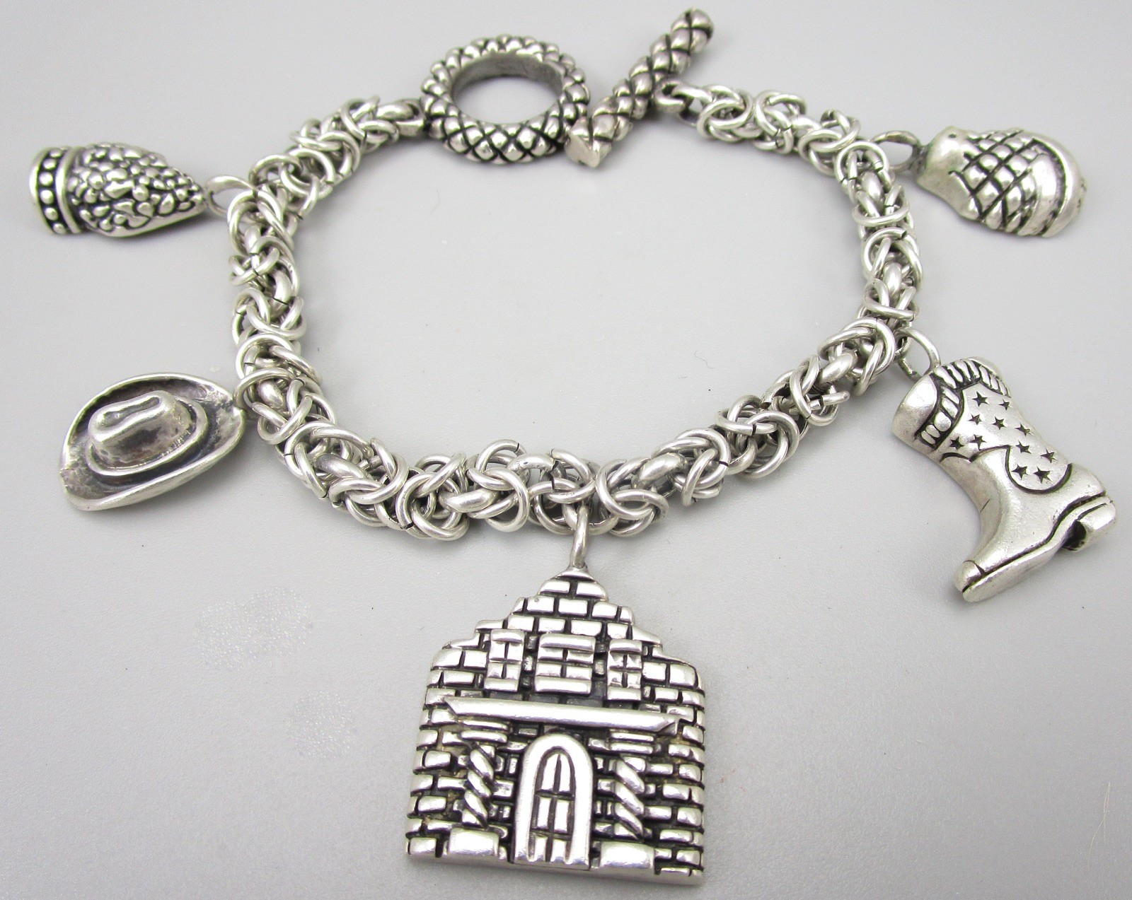 SCARCE DIAN MALOUF STERLING SILVER TEXAS THEME CHARM BRACELET 60 GRAMS