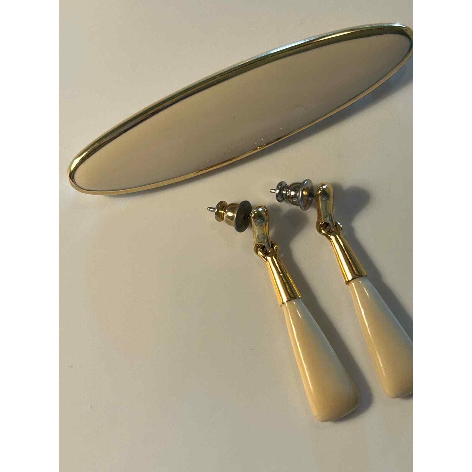 Elegant Monet Ivory and Gold Tone Oval Brooch and Earring Set