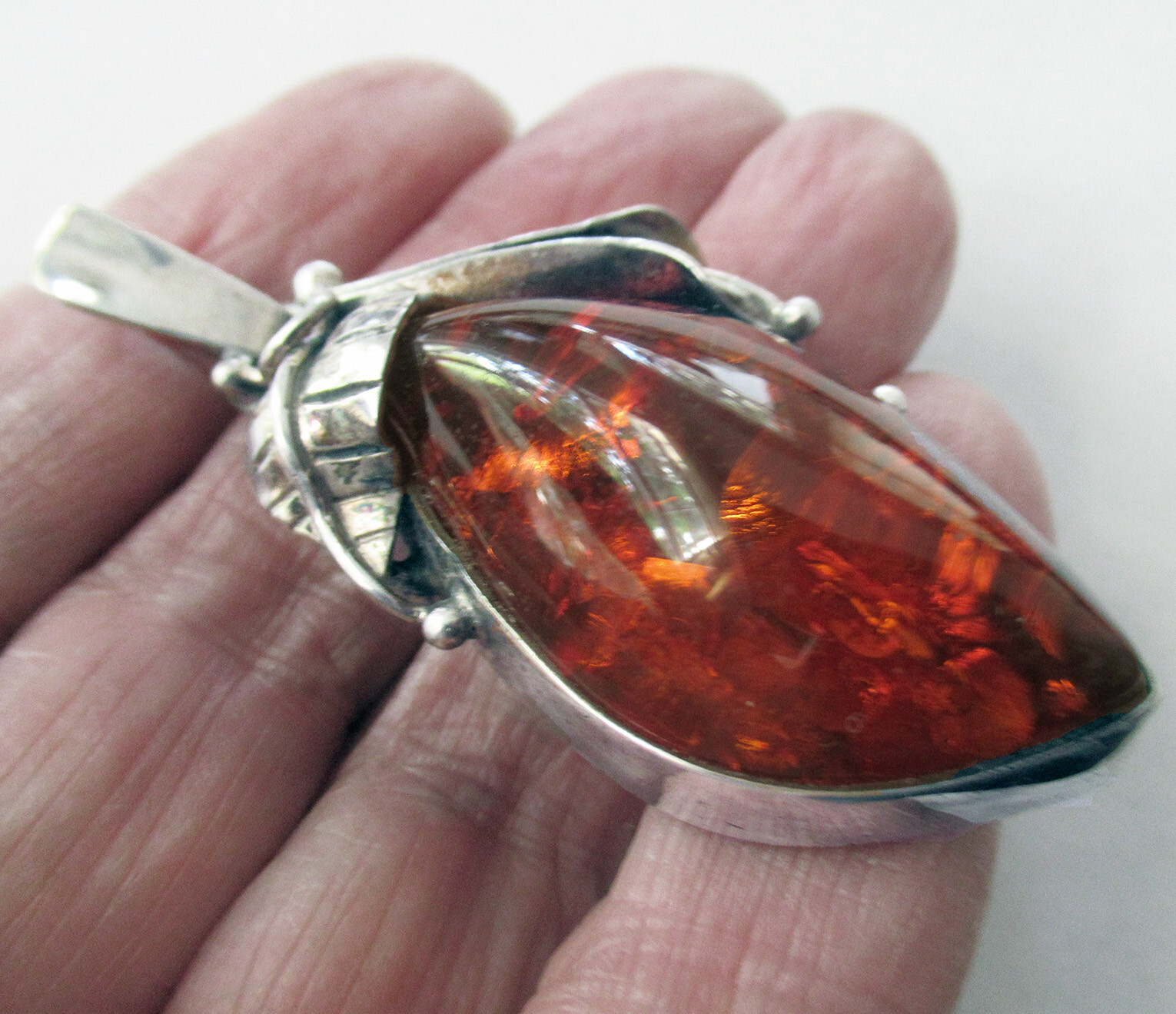 STERLING & AMBER PENDANT -2 3/8 INCHES, 15 GRAMS