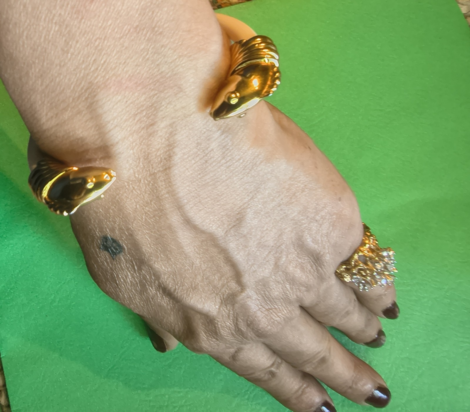 Signed Monet vintage bracelet with a bright gold-tone finish.