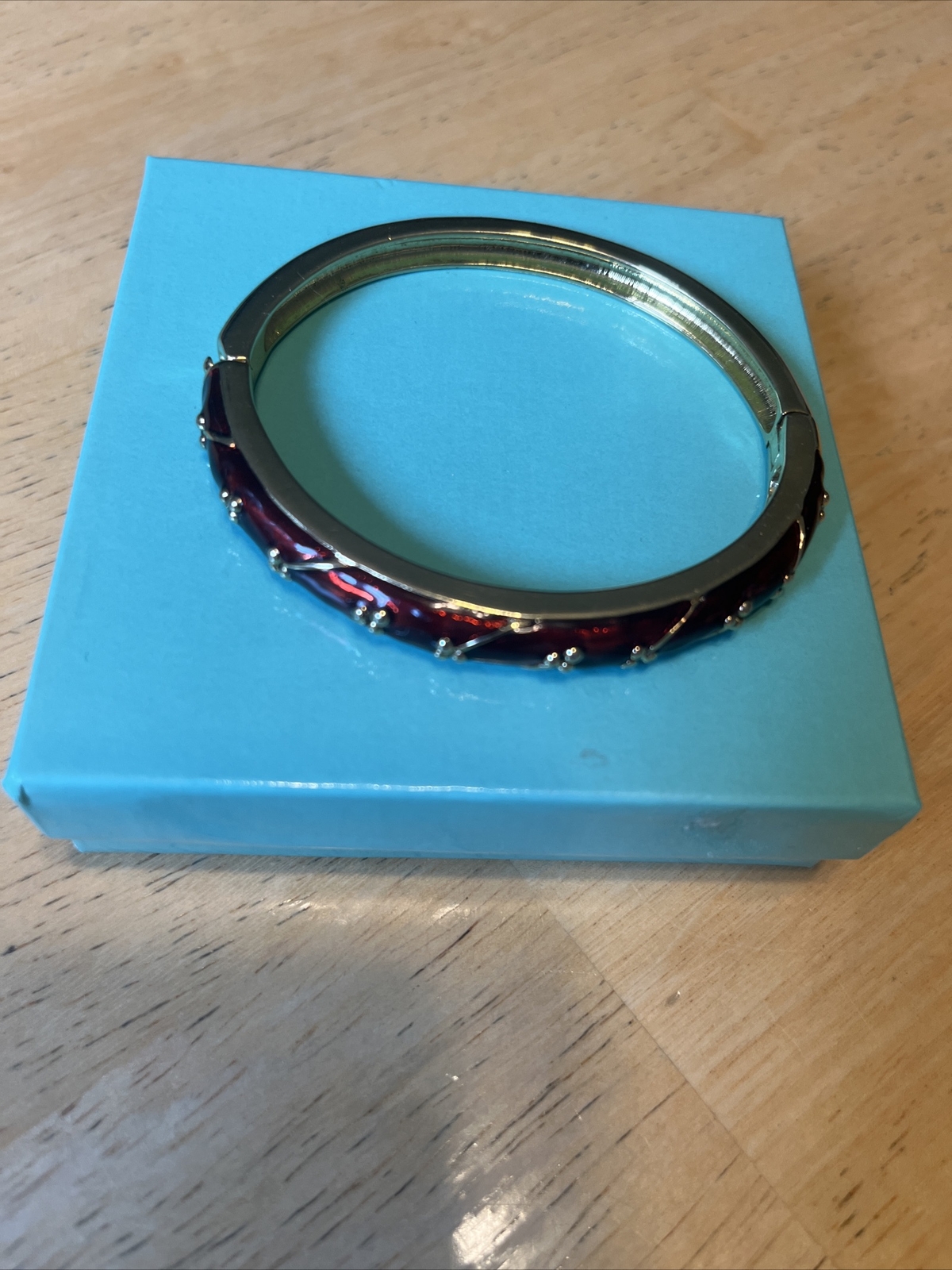 2 Gold Tone Enamel Bracelets Red (Marked Napier ) and Blue (not sure see pics)