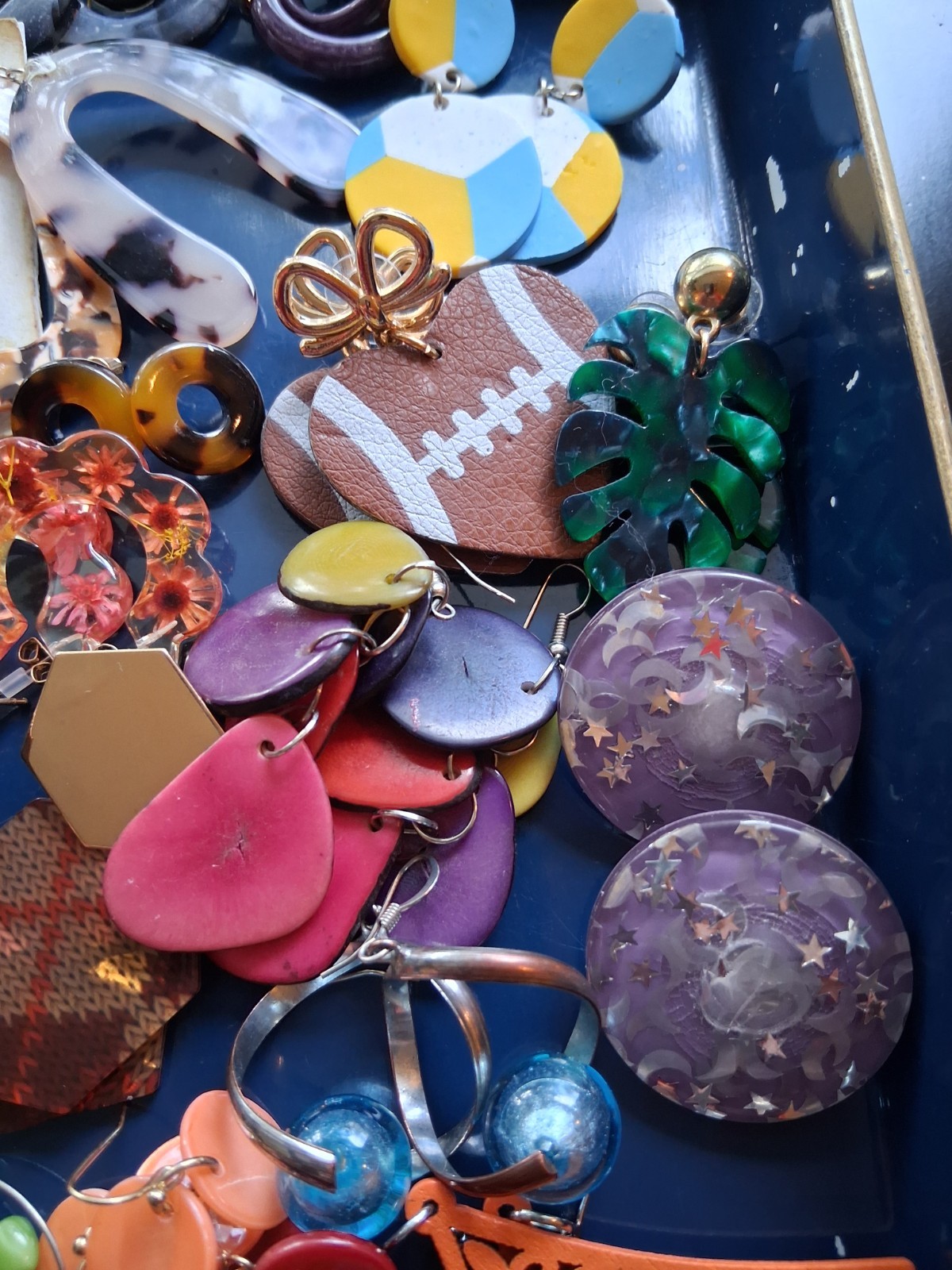 30 + Colorful Glitter Lucite, Acrylics, painted metals, and wood relief earring