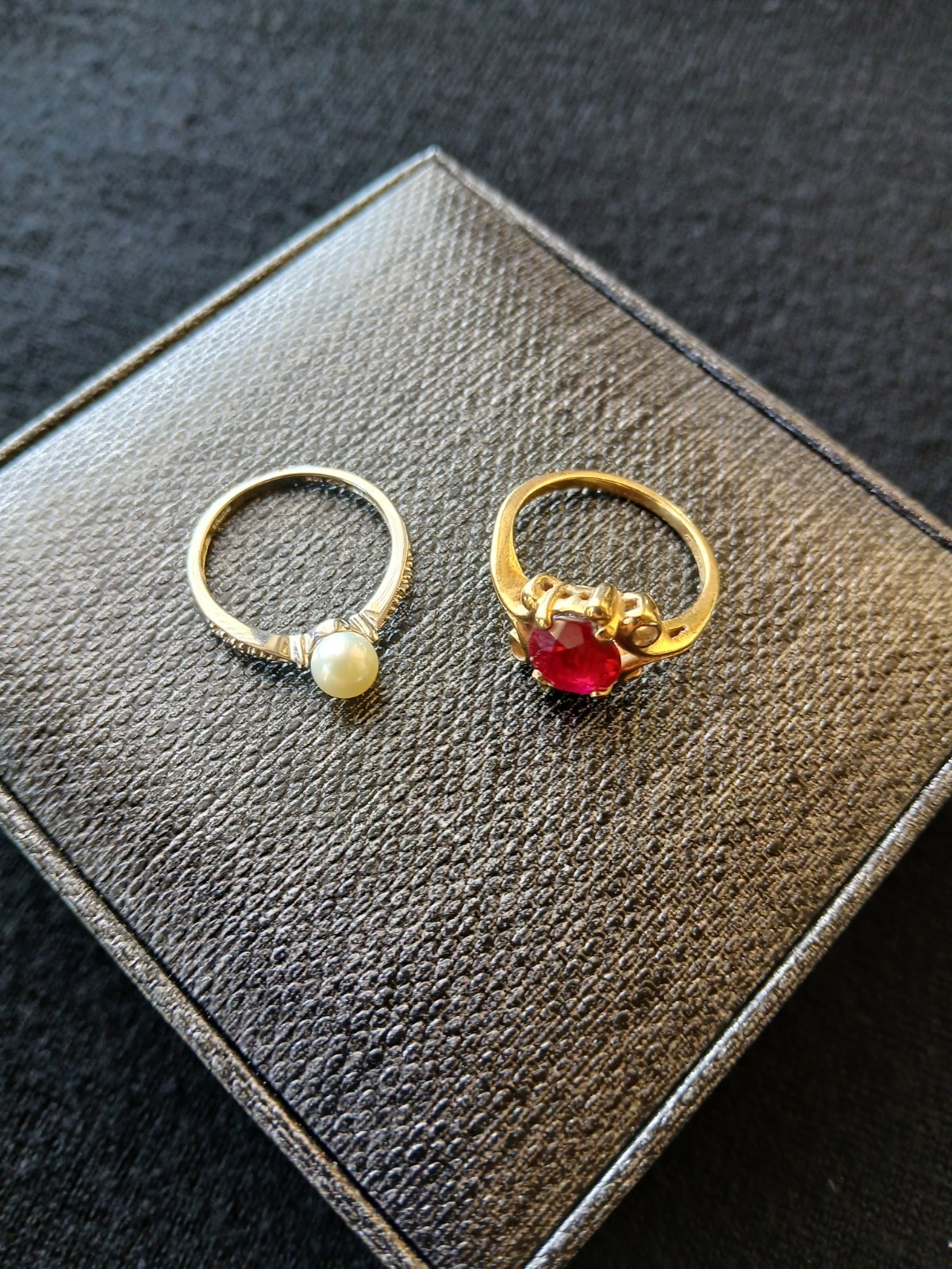 TWO PRE OWNED GOLD RINGS
