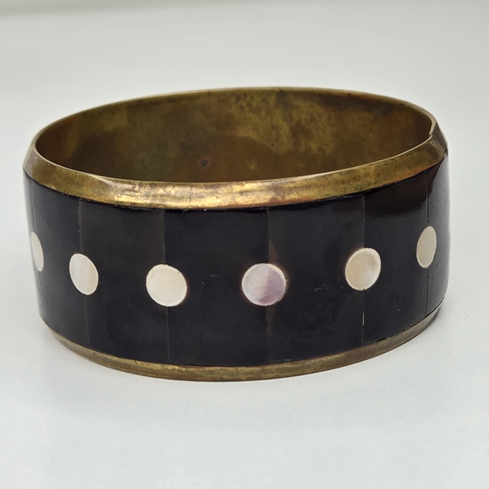 Vintage 8 Inch Gold Tone Metal Black Stone And White Shell Inlay Bangle Bracelet
