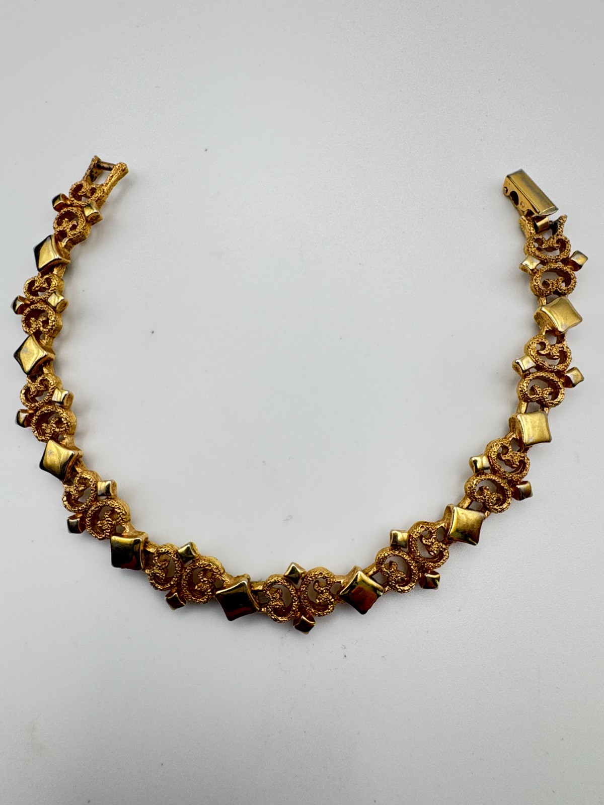 Vintage Avon Bracelet Precious Pretenders Gold Tone Scroll Link 1971