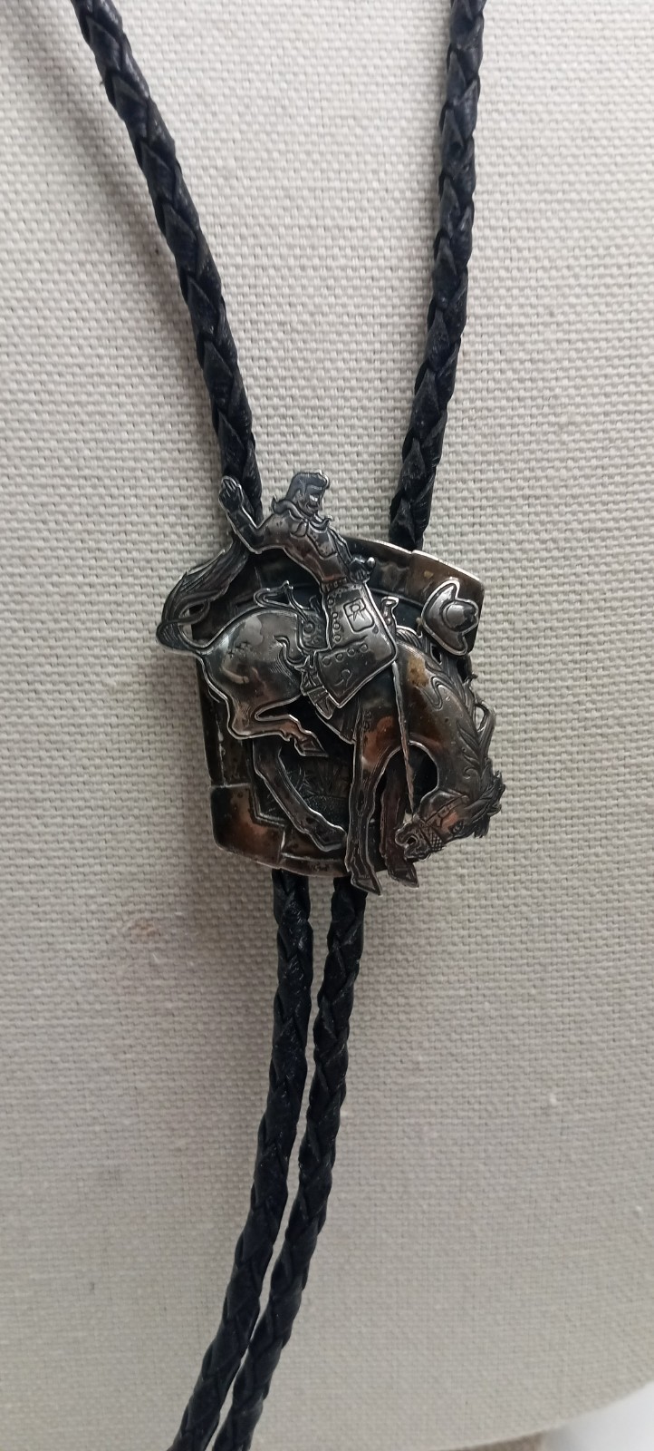 1990’s Kit Carson 925 Sterling Silver “Let er Buck” Bolo Tie (very rare and htf)