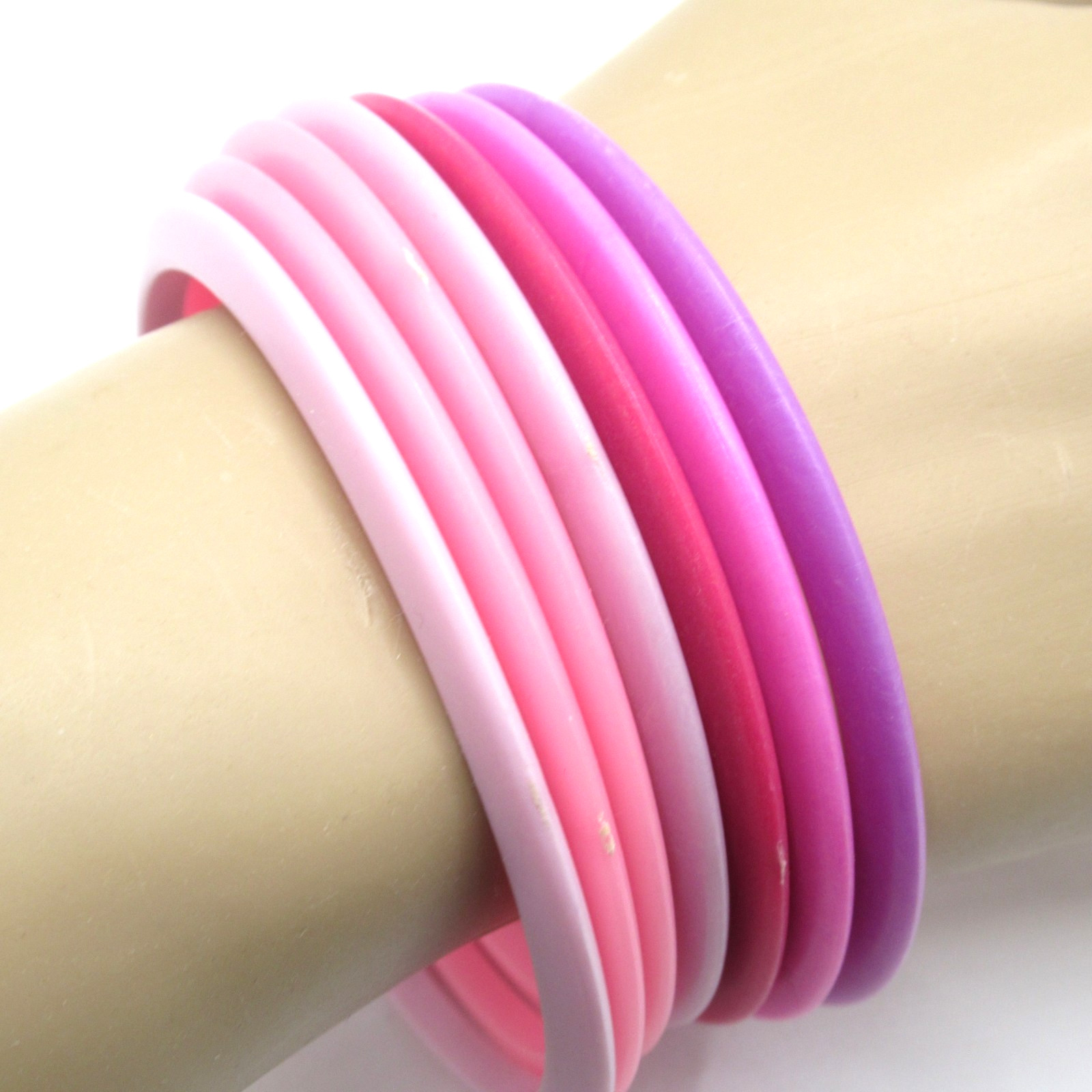 Lot of Seven Thin Plastic Bangle Bracelets Pinks Purples Plums Shades Vintage