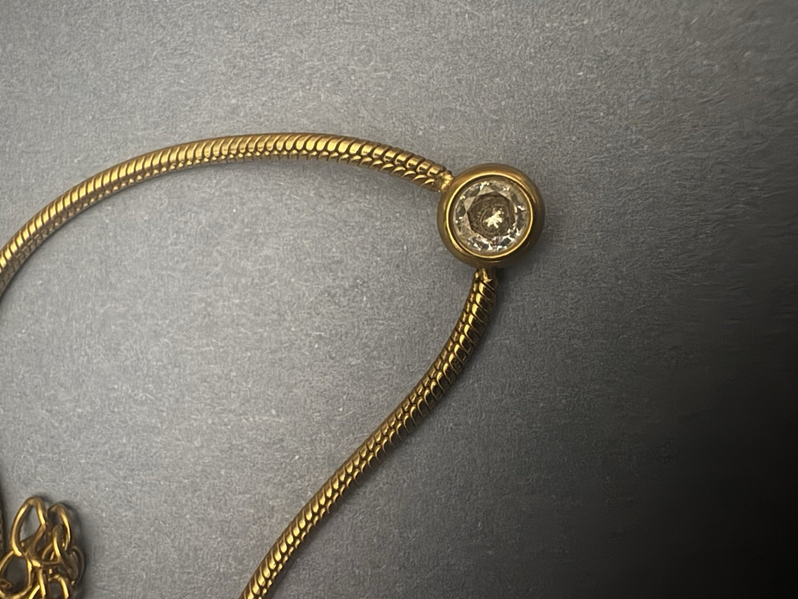 VTG Gold Tone Bezel Set Small Round CZ On A Snake Chain 16in With 3In Extender