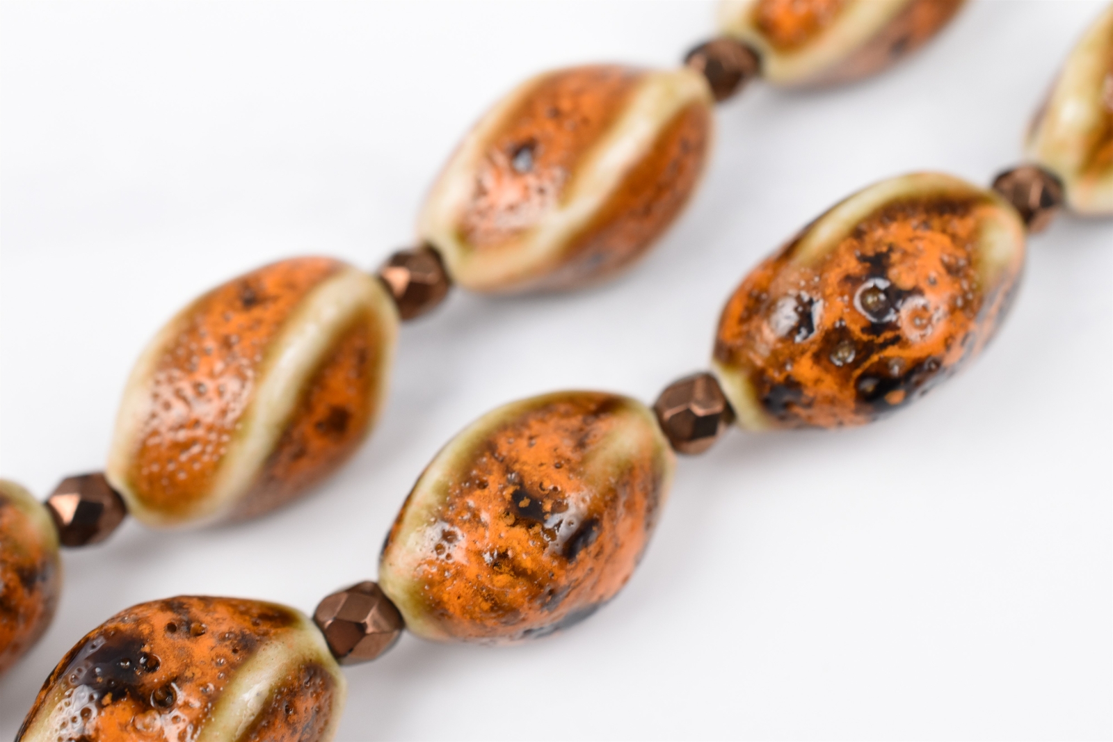 Gold Plated 21″ Cream Brown Orange Twist Ceramic Necklace w/ Bronze Spacers