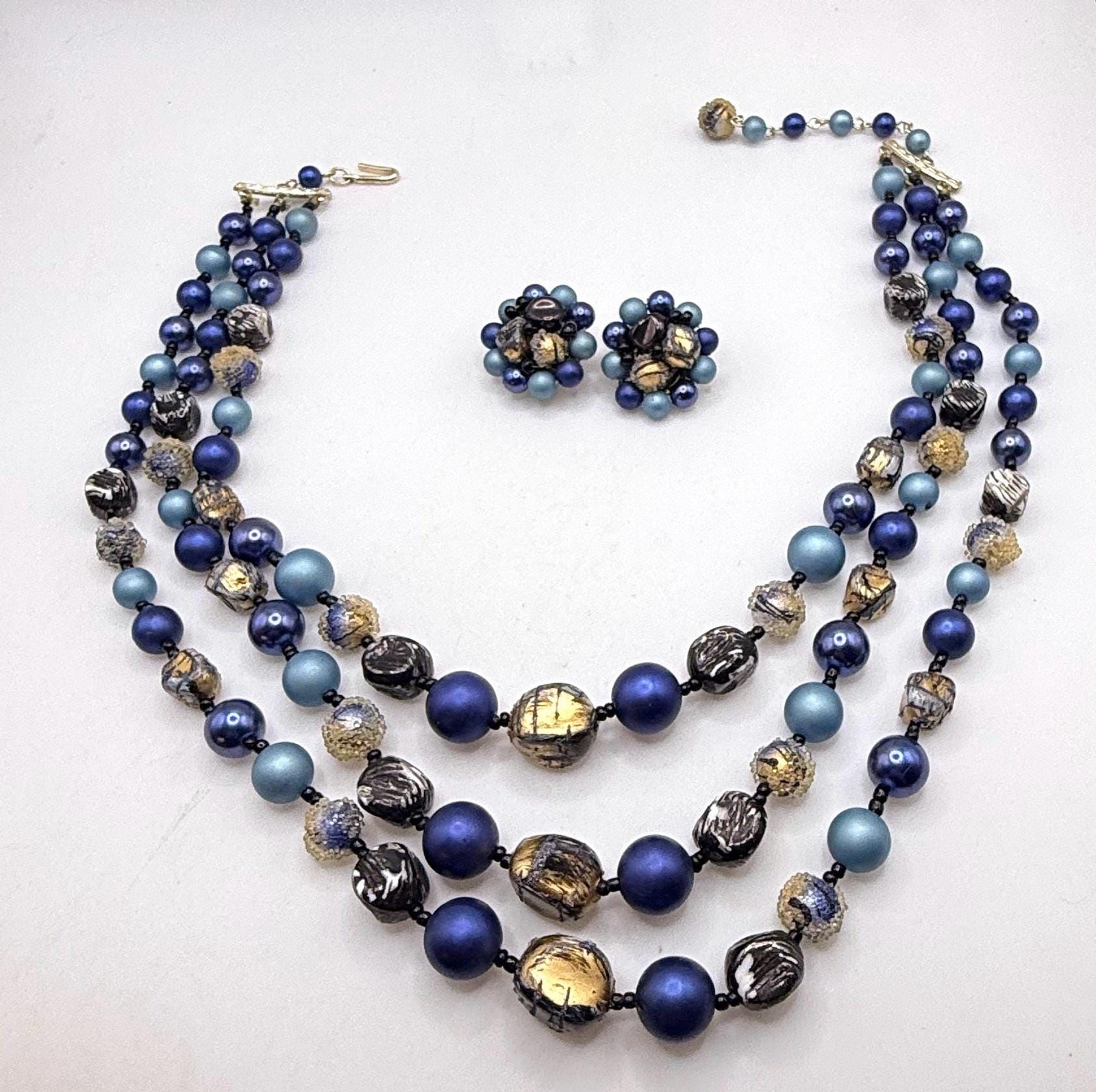 Vintage blue and gold two strand necklace and clip on earring set