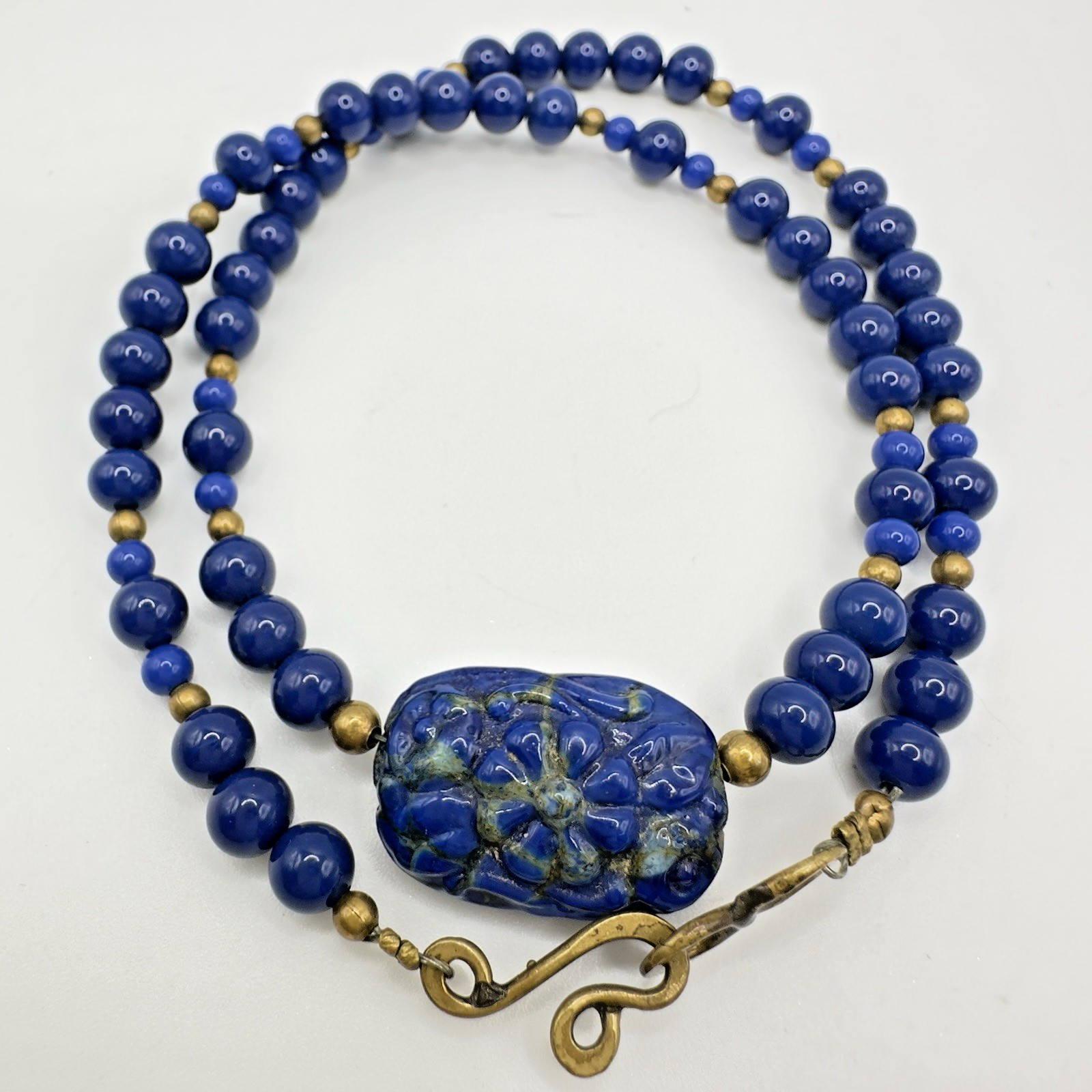 Artisan Blue Beaded Necklace Carved Floral Center Brass Hook Clasp 18″ Handmade