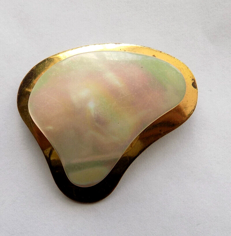 Vintage Mother-of-Pearl Brooch on a gold-colored metal base.