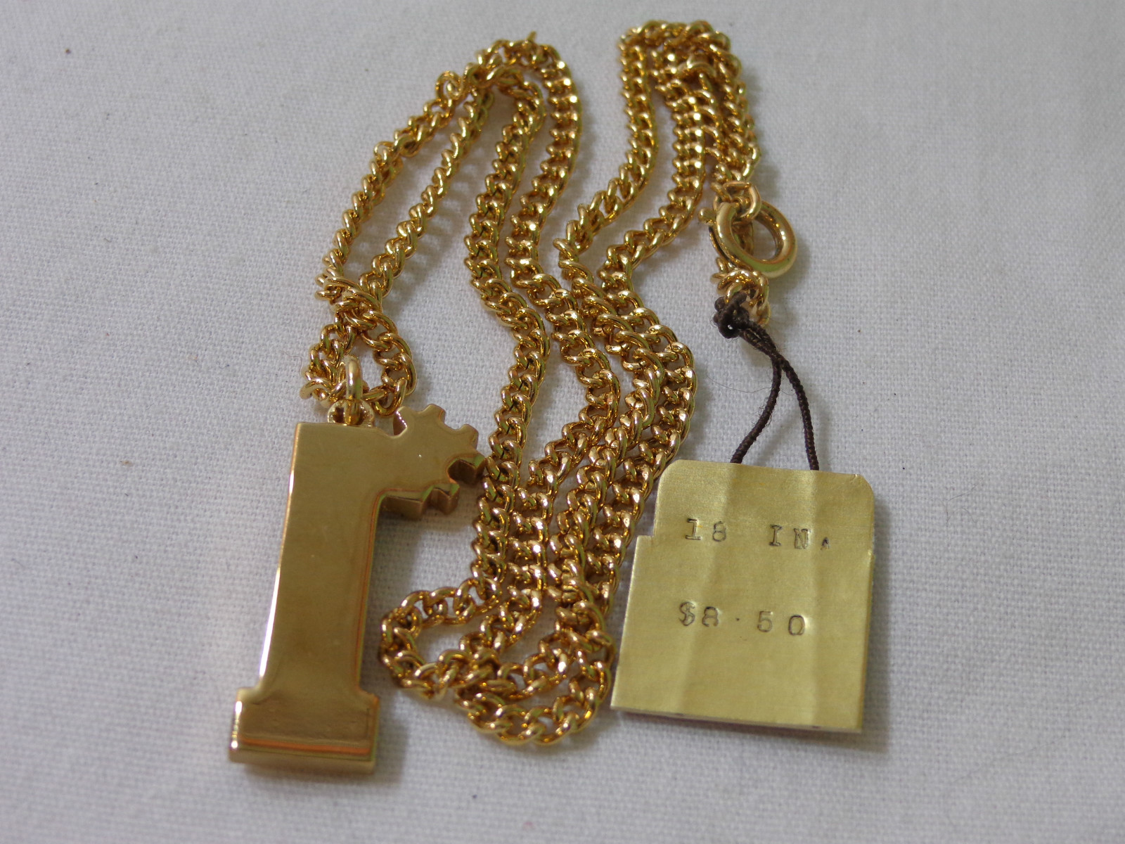 VINTAGE GOLD TONE NECKLACE SWANK 1970’S 1980’S NOS #1 PENDANT ONE FIRST PLACE