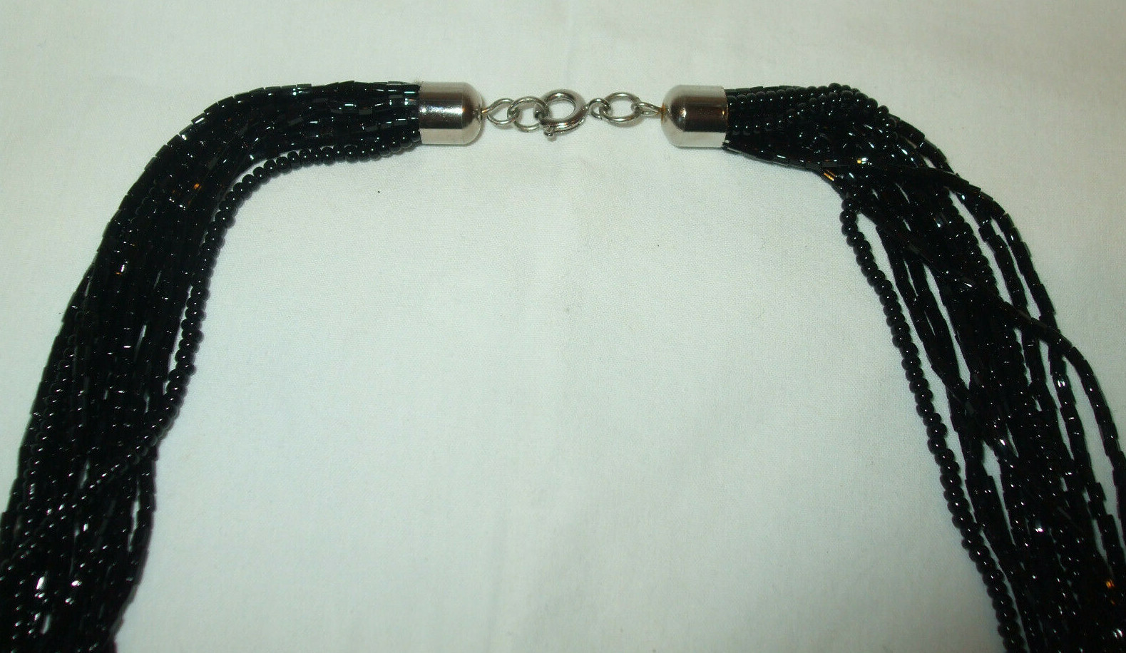 VINTAGE MULTI STRAND BLACK GLASS SEED BEAD NECKLACE 20″~NECKLACE ONLY