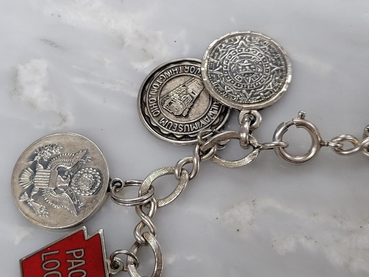 Vintage Sterling Silver Charm Bracelet w/ 12 Charms ~ 7-1/4″ ~ 42.7g ~ 5-E508