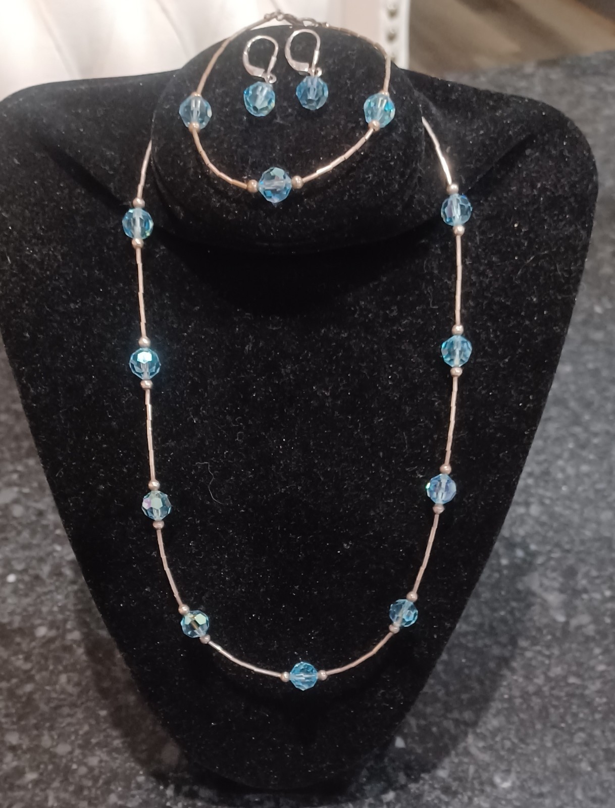 Set Of Silver And Blue Crystal Bead Matching Necklace, Bracelet, And Earrings