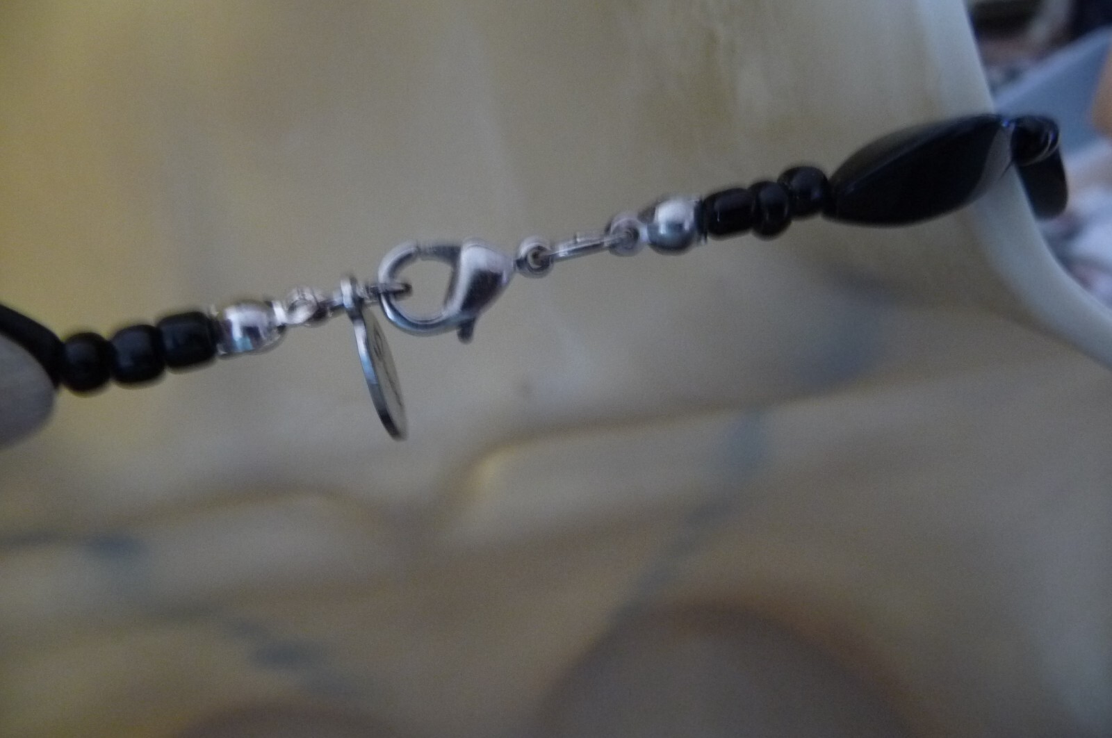 #810A NECKLACE 15″L BY GWEN BLACK BEADS w LARGE 2 3/4″ R BLACK FLOWER PENDANT
