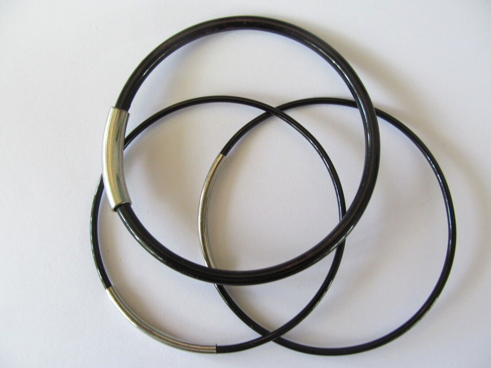 THREE DIFFERENT SHAPES BLACK METAL w/SILVER BAND DESIGNS SLIP ON BANGLE BRACELET