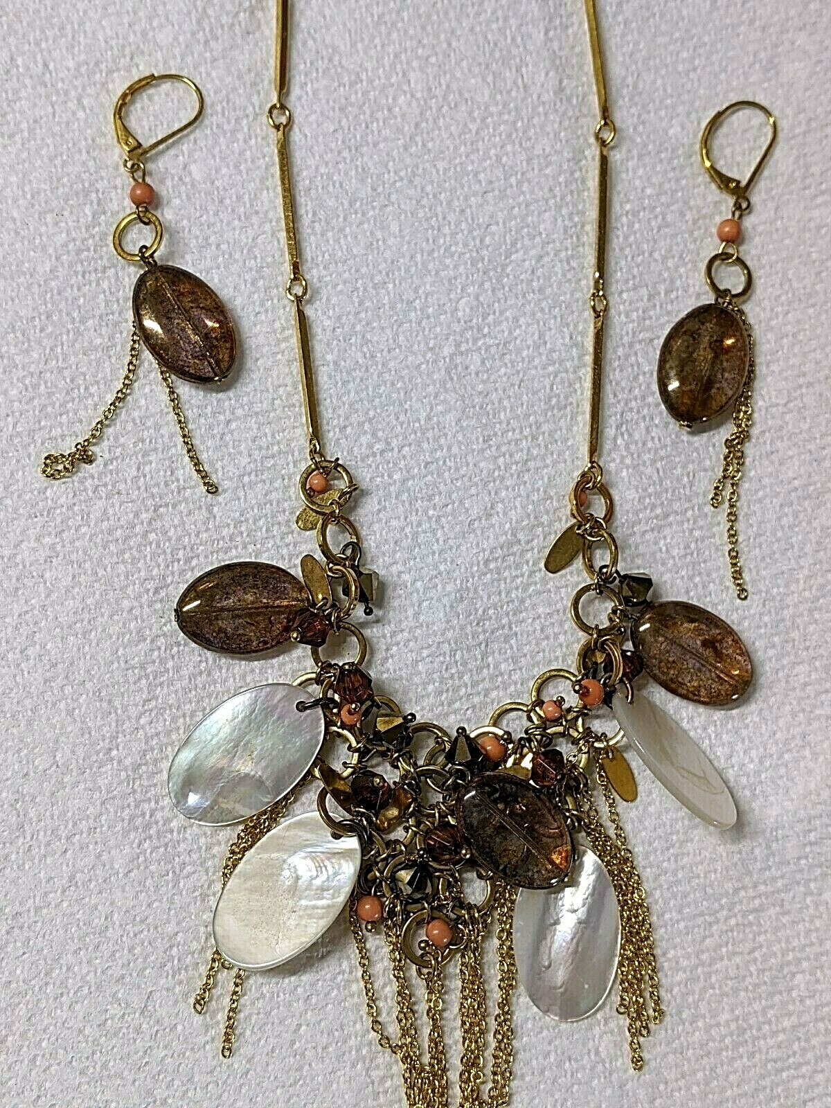 Gold tone mother of pearl, earring and necklace set peach, brown beads, China