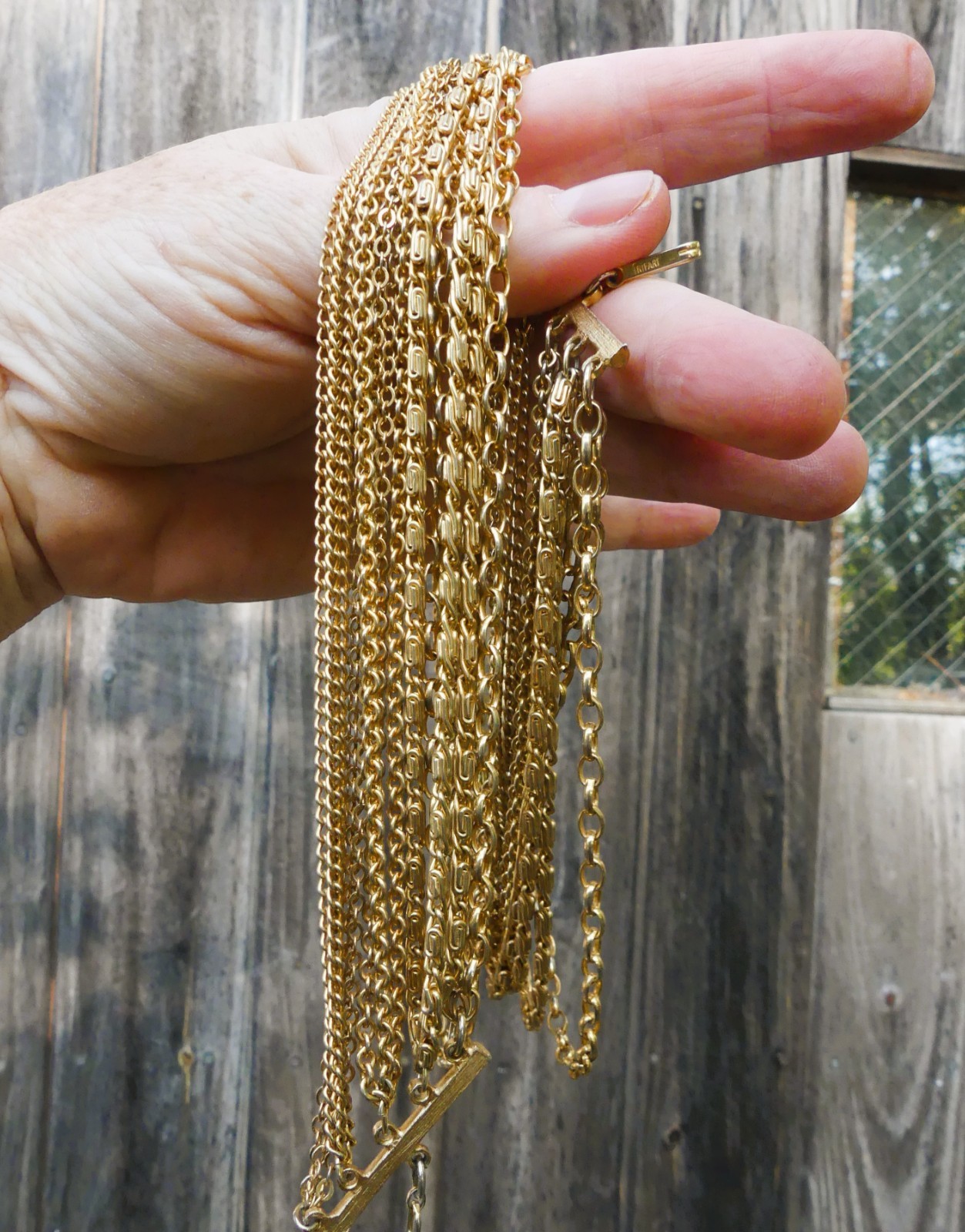 Vintage Trifari multistrand chain necklace goldtone multichain19-22 inches swag