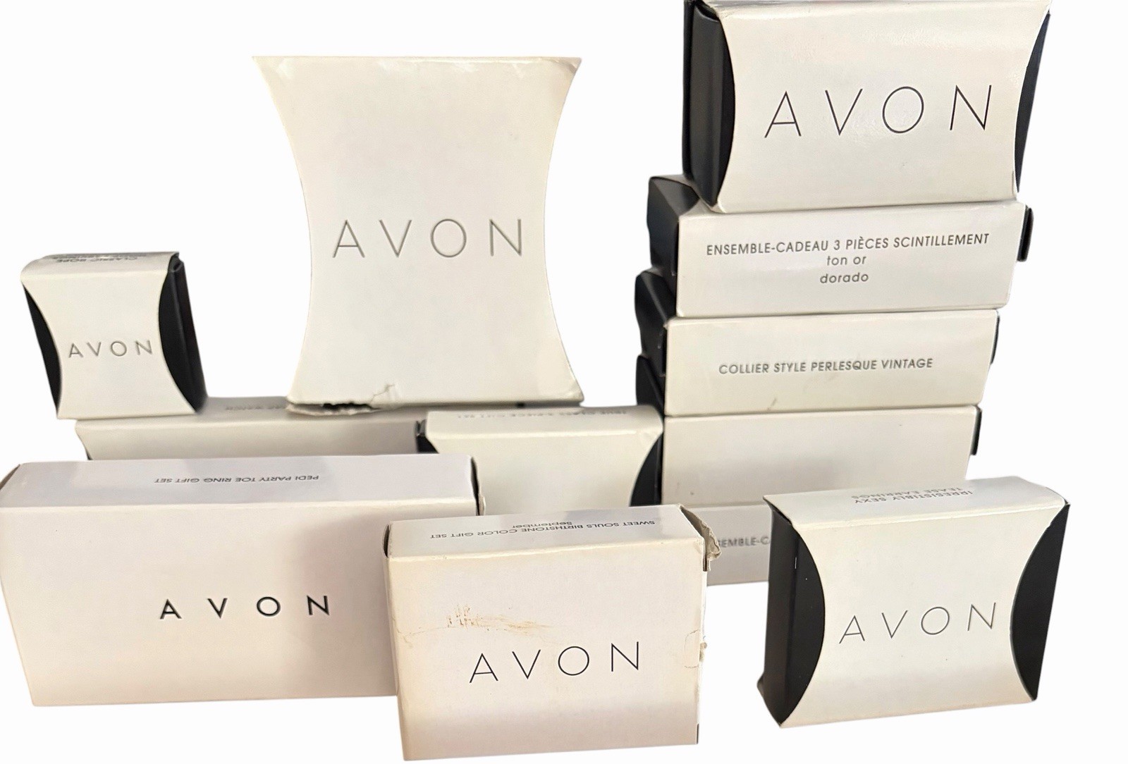 12 Pcs Vintage Avon Collectors New In Boxes /Jewelry Never Used. Boxes Some Wear