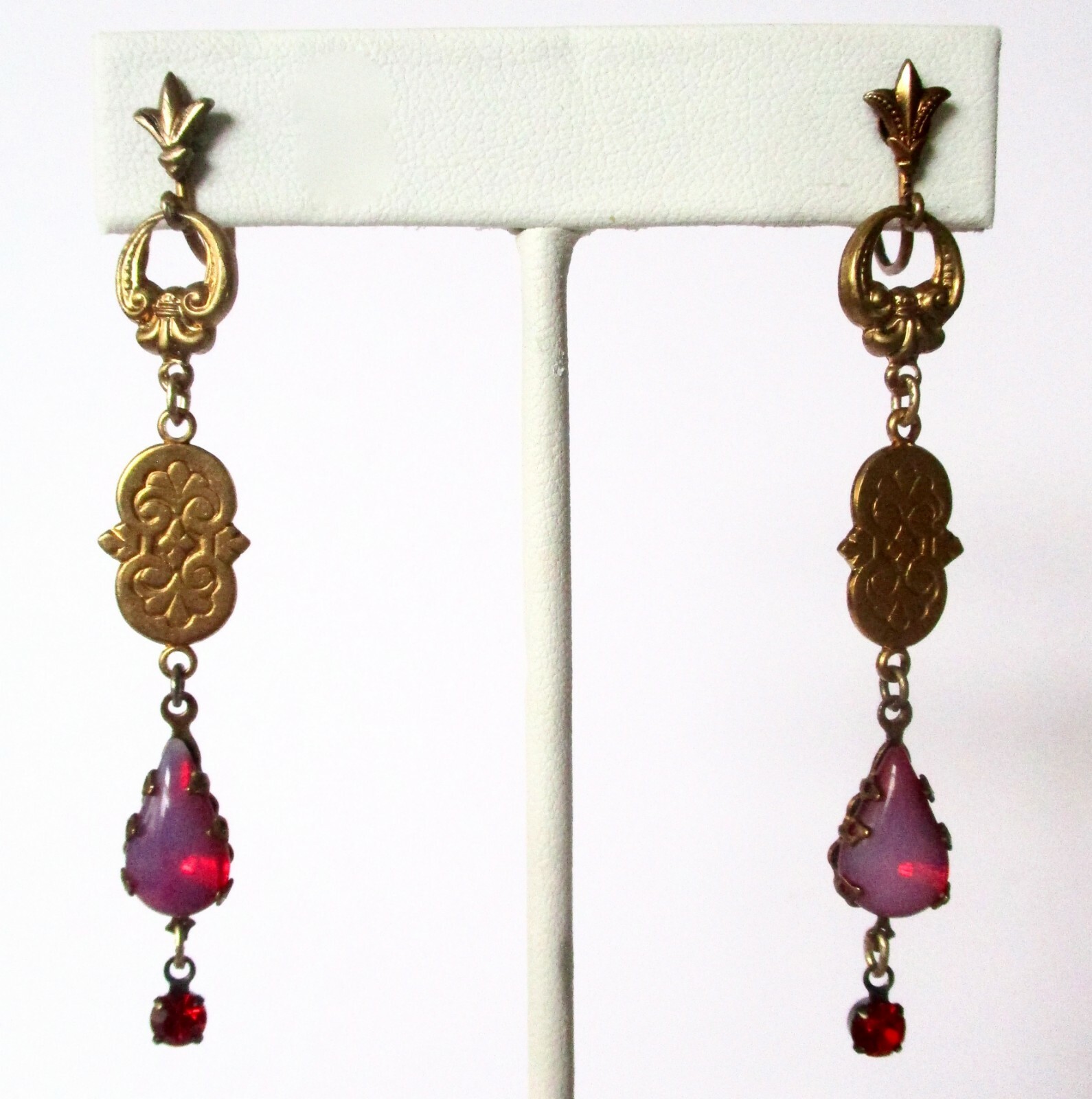 Pair of Antique Brass Screw Back Earrings With Opalescent Red Crystal Stones