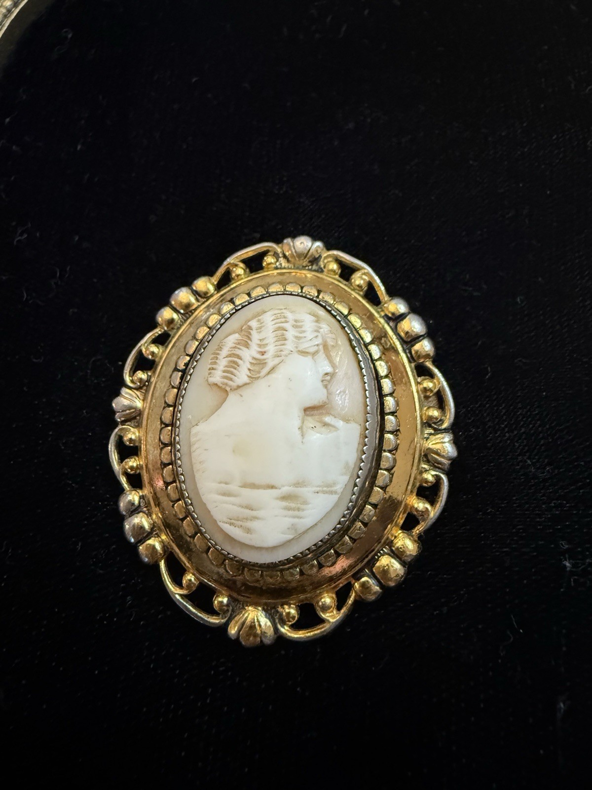 Right facing antique hand-carved shell cameo brooch with gold-filled setting