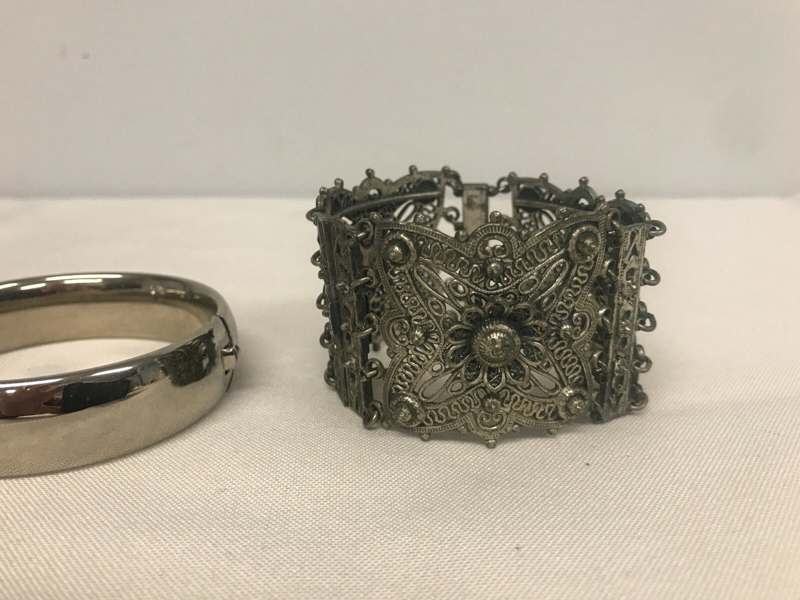 3 VINTAGE SILVERTONE HINGED BANGLE, PIERCED FILLIGREE & ETCHED FLOWER BRACELETS
