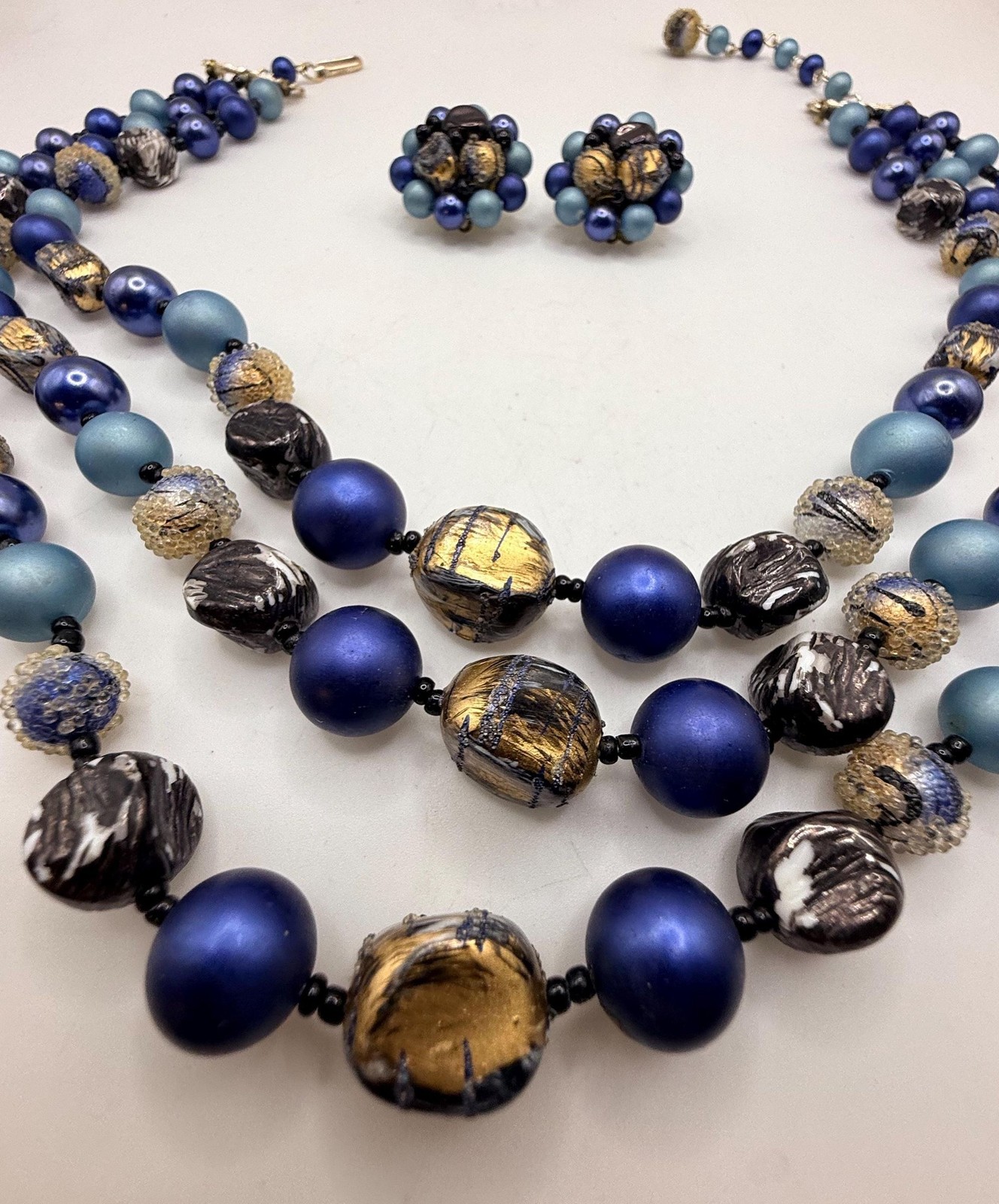 Vintage blue and gold two strand necklace and clip on earring set