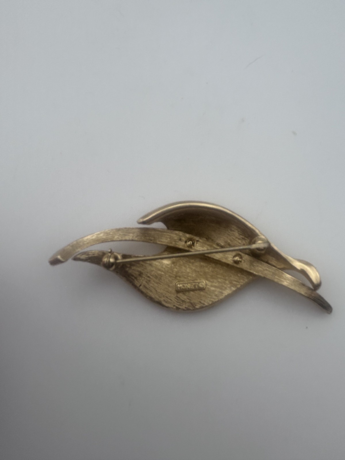 Vintage Wave-Shaped Ribbon Monet Brooch Brushed Gold Tone