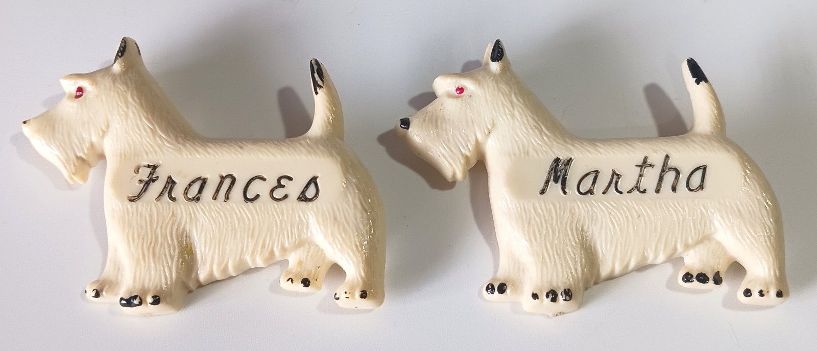 Pair of Vintage Off-White Celluloid Westie Dog Brooches: Frances & Martha