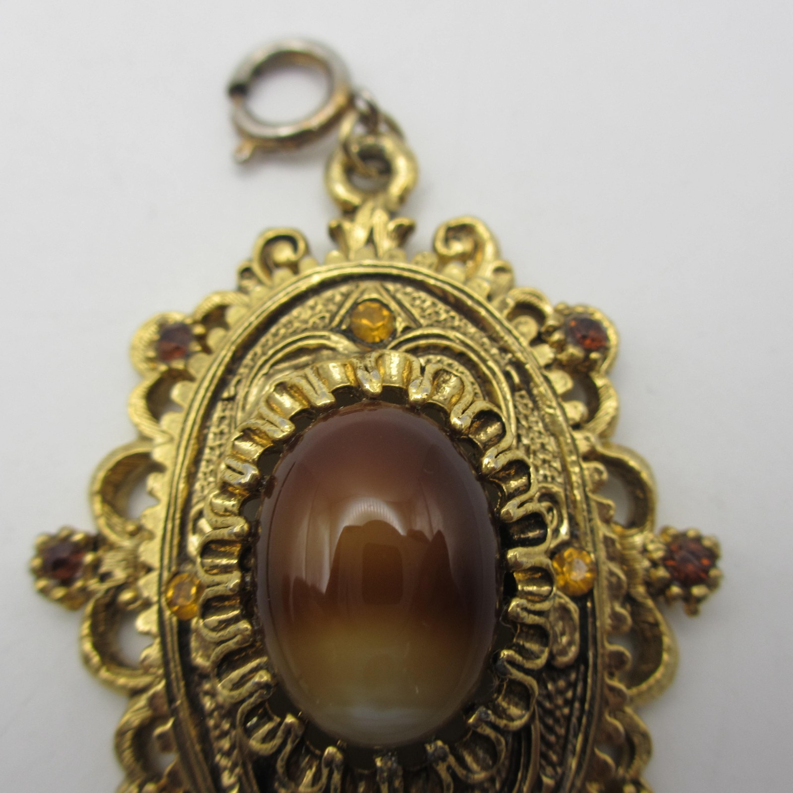 Vintage Celebrity Pendant Rhinestone Cabochon Ornate Textured Gold Tone