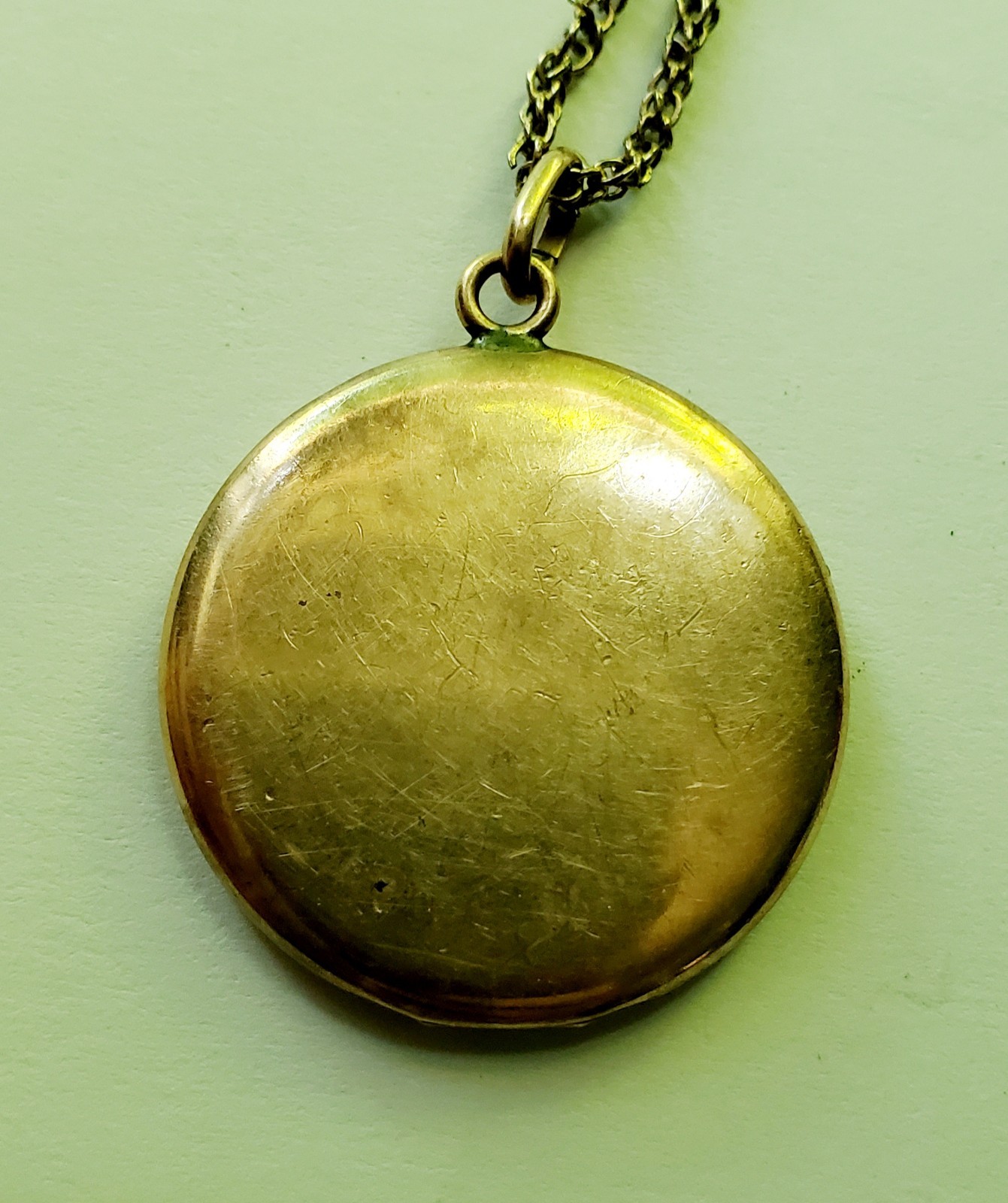 Antique gold tone etched/monogrammed locket pendant necklace stamped F.L.S.