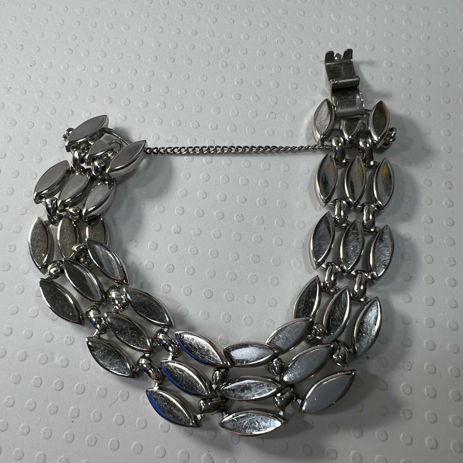 Vintage MONET 5/8″ x 7 1/4″ SILVER TONE heavy bracelet with safety chain