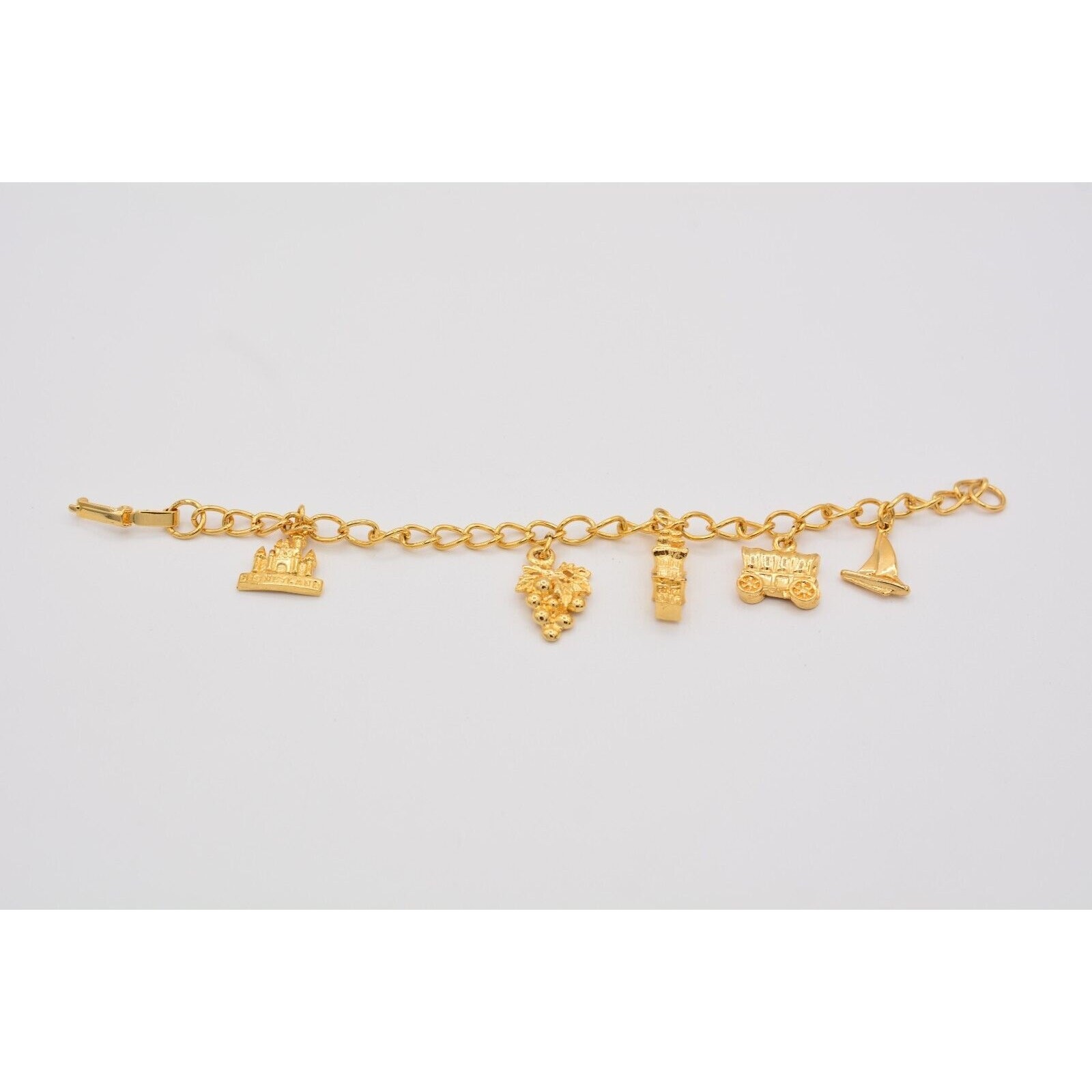Vintage Charm Bracelet Disneyland Grapes Sailboat Gold Tone Chain Dangle BinAD