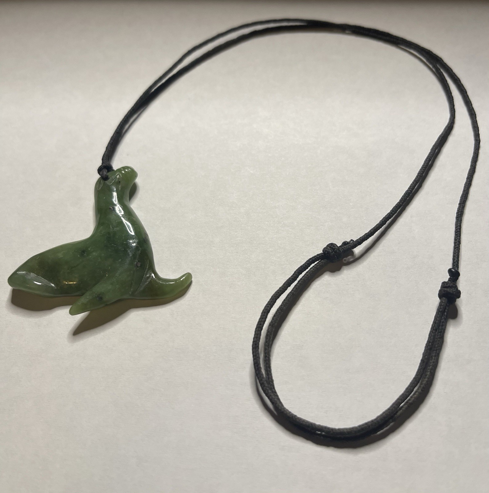 Jade Carved Pendant On A Black Chord