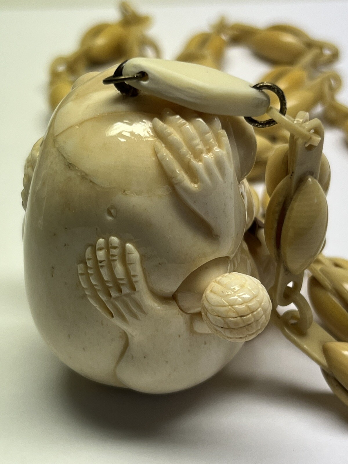 ANTIQUE ART DECO MONKEY NECKLACE TAPE MEASURE CELLULOID CHAIN PENDANT WHIMSICAL