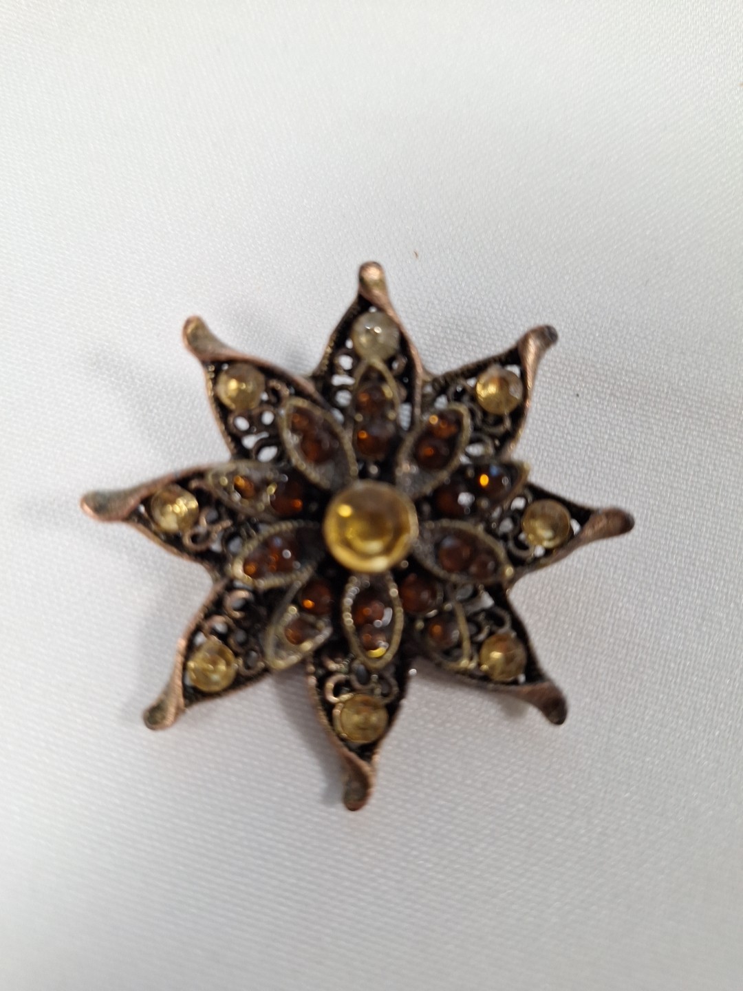 Brass Tone 8 Pointed Star Brooch With Topaz & Amber Stones