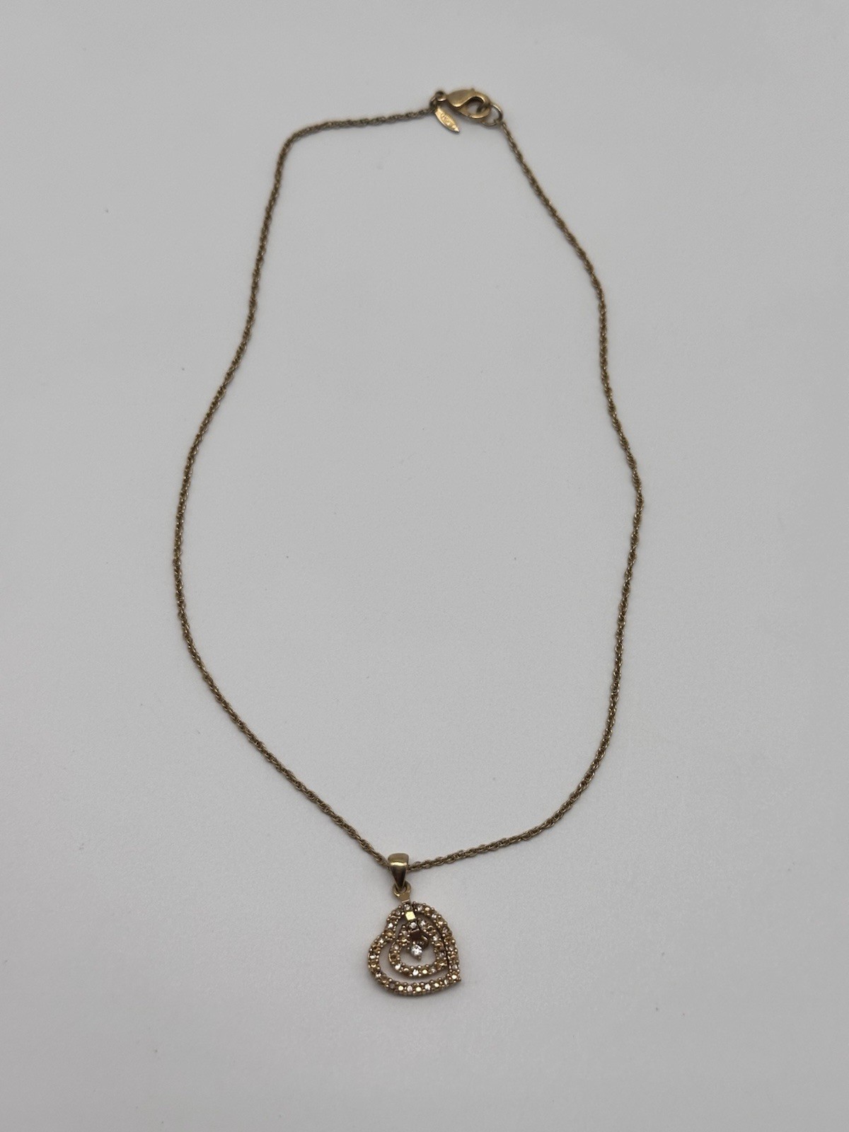 Avon Triple Heart Pendant Gold Tone And CZ Chain Necklace Graduated Open Hearts