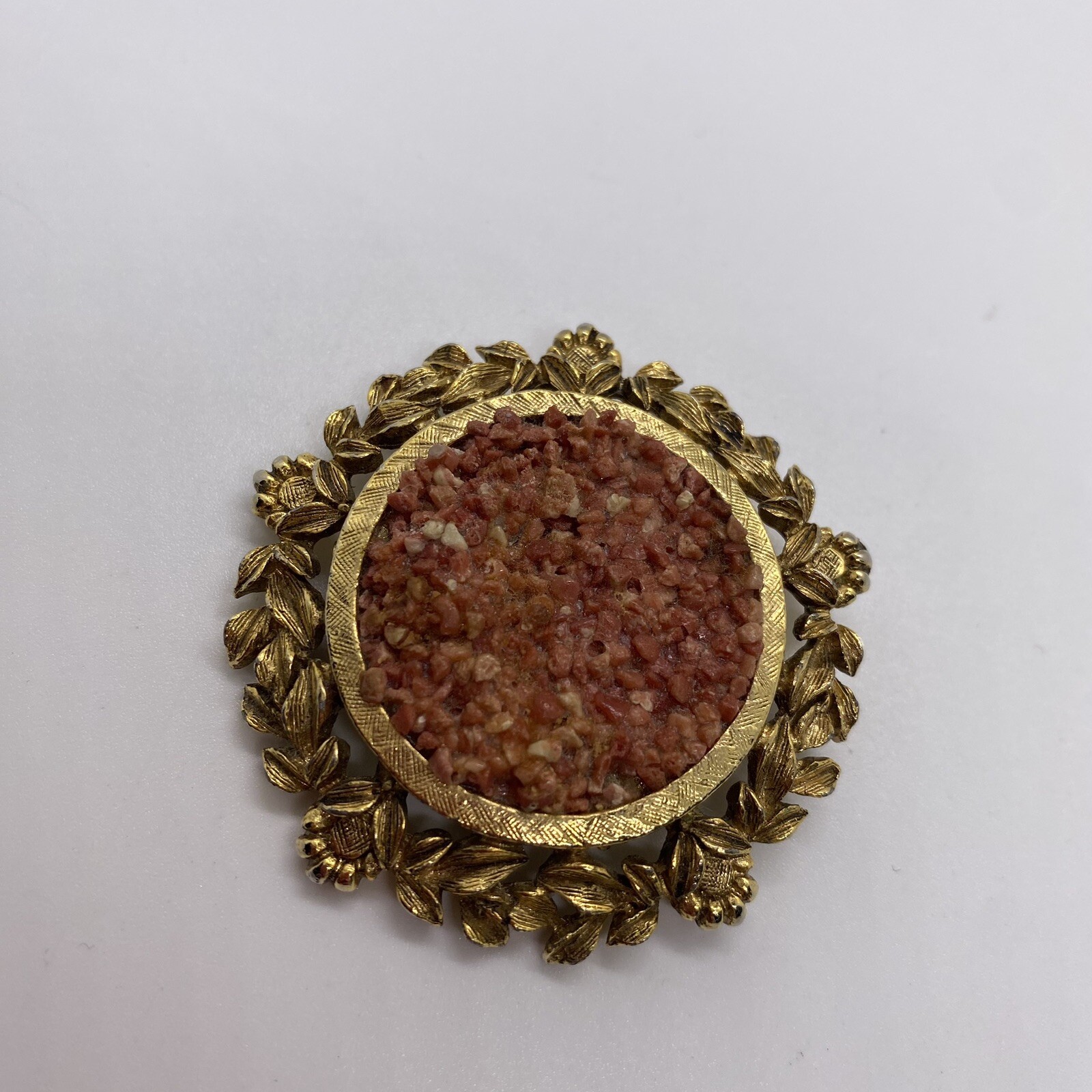 Brooch- Vintage Round Gold Tone Designed Trim With Small Salmon Color Stone Pin