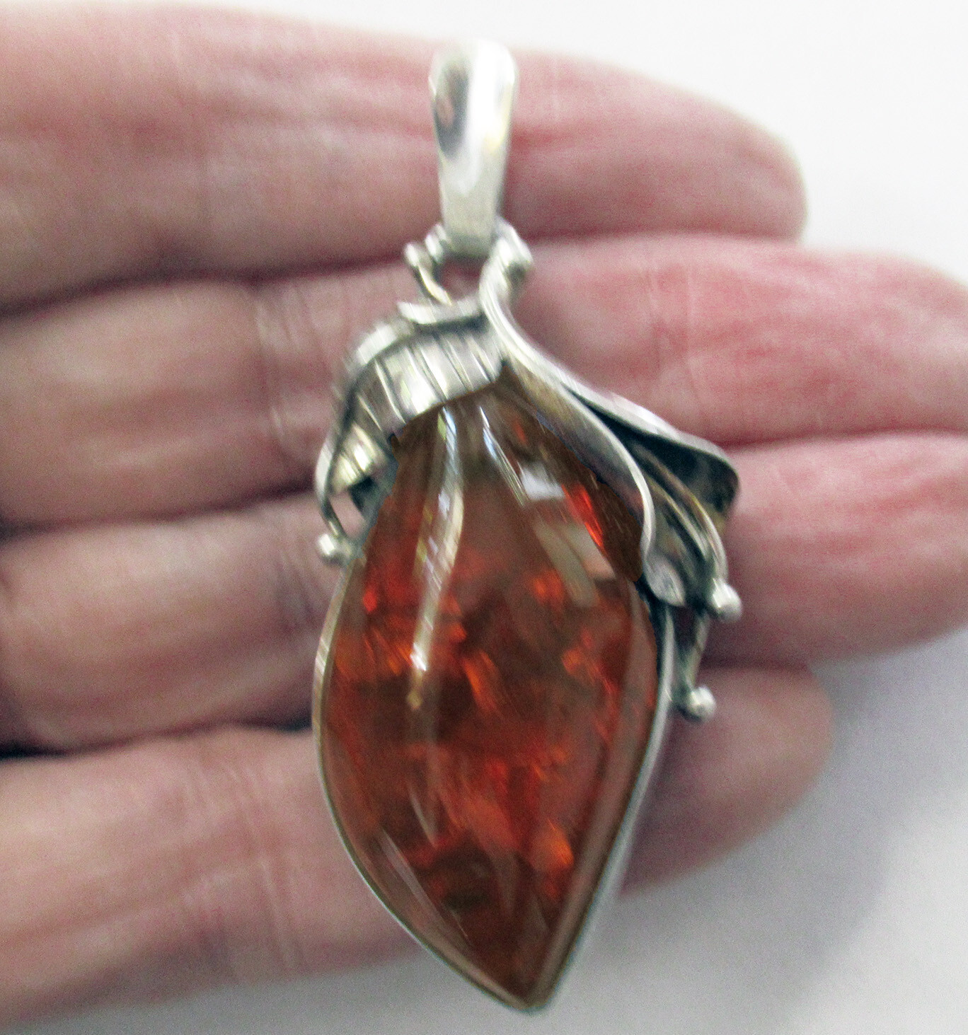 STERLING & AMBER PENDANT -2 3/8 INCHES, 15 GRAMS