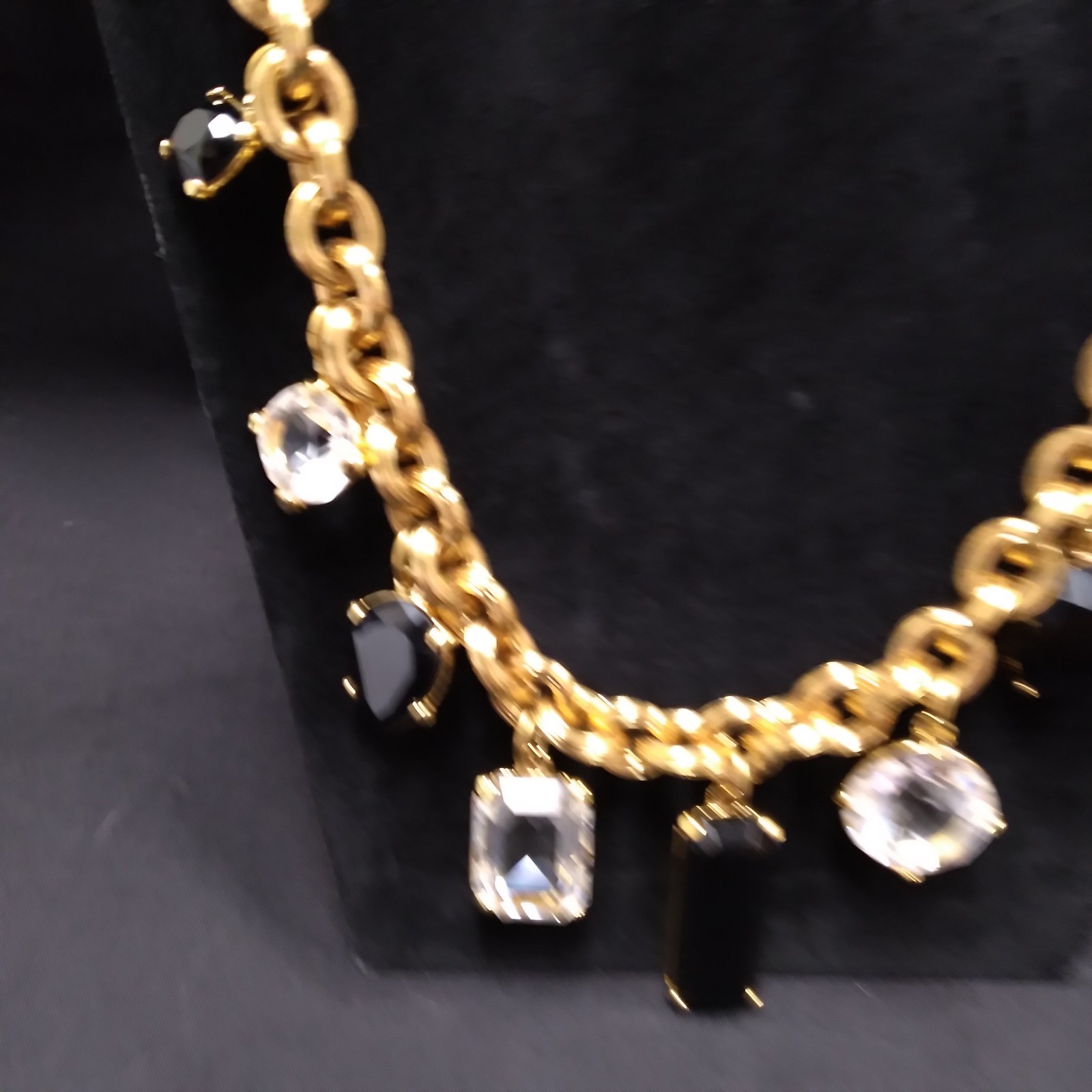 Monet Gold Tone Chunky Necklace with Clear and Black Crystal Charms
