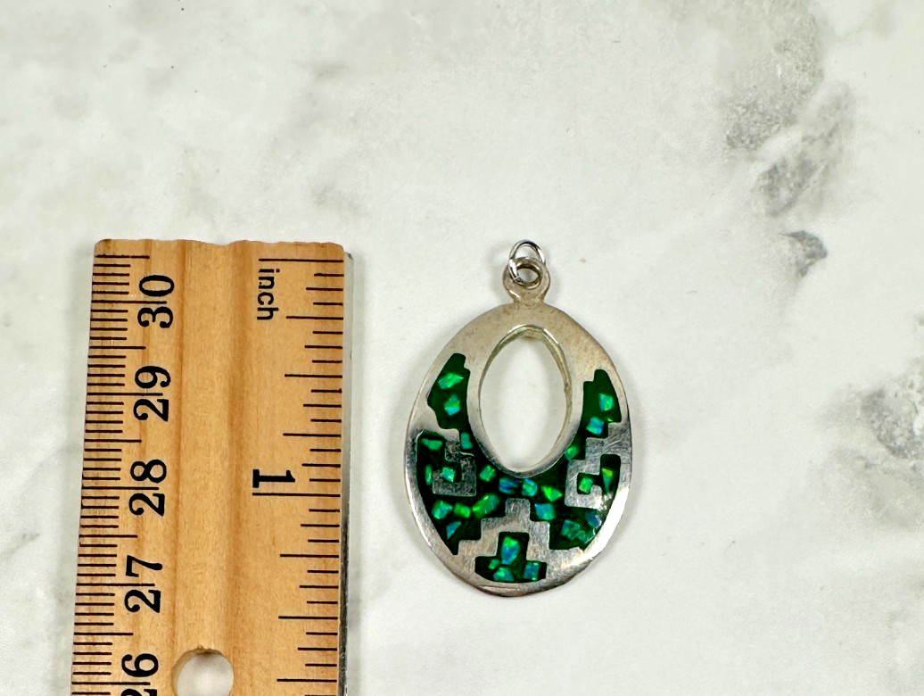 Sterling Silver Green Opal Chip Inlay Oval Cut Out Pendant – 1 1/2″ Long