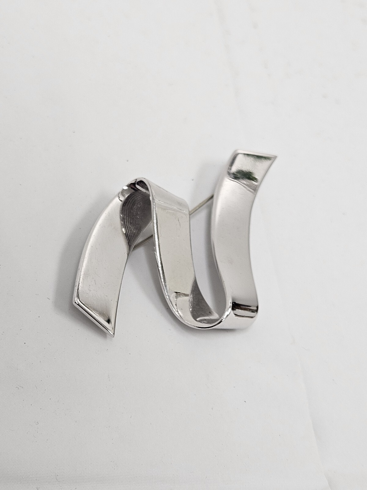 Vintage Monet Silver Tone Swirl Ribbon Pin Signed Mid Century Modern