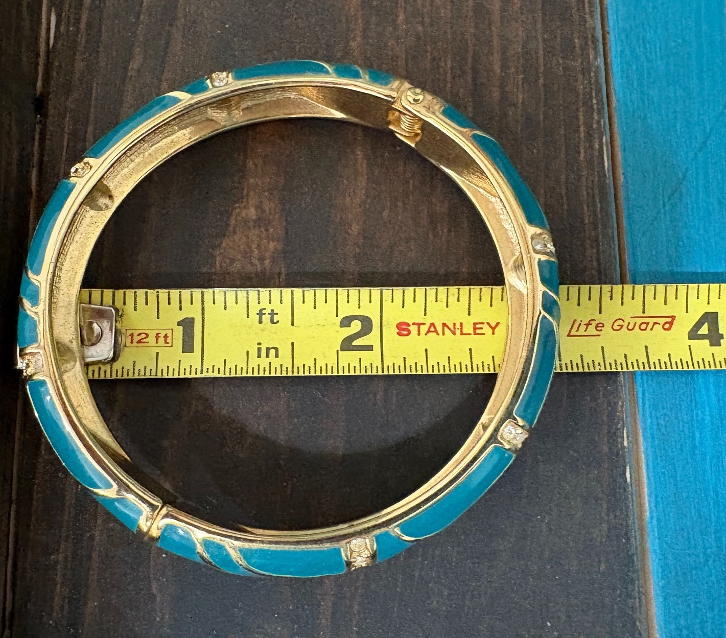 Vintage “Perfect Wave” azure blue enamel and crystal hinged bangle gold tone